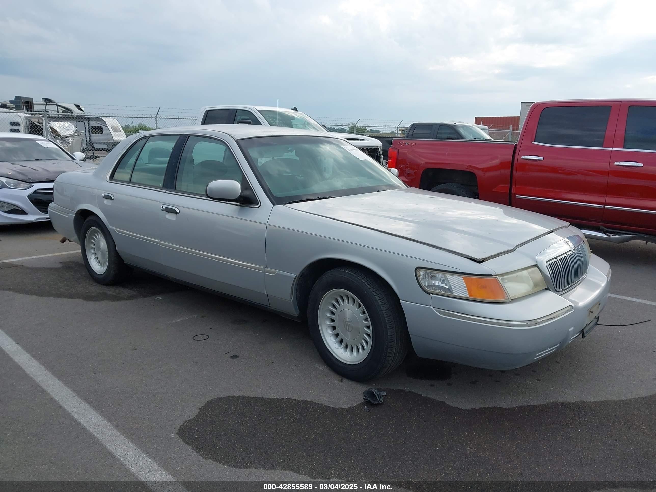 1998 Mercury Grand Marquis LS, VIN 2MEFM75W9WX643962 — Hail