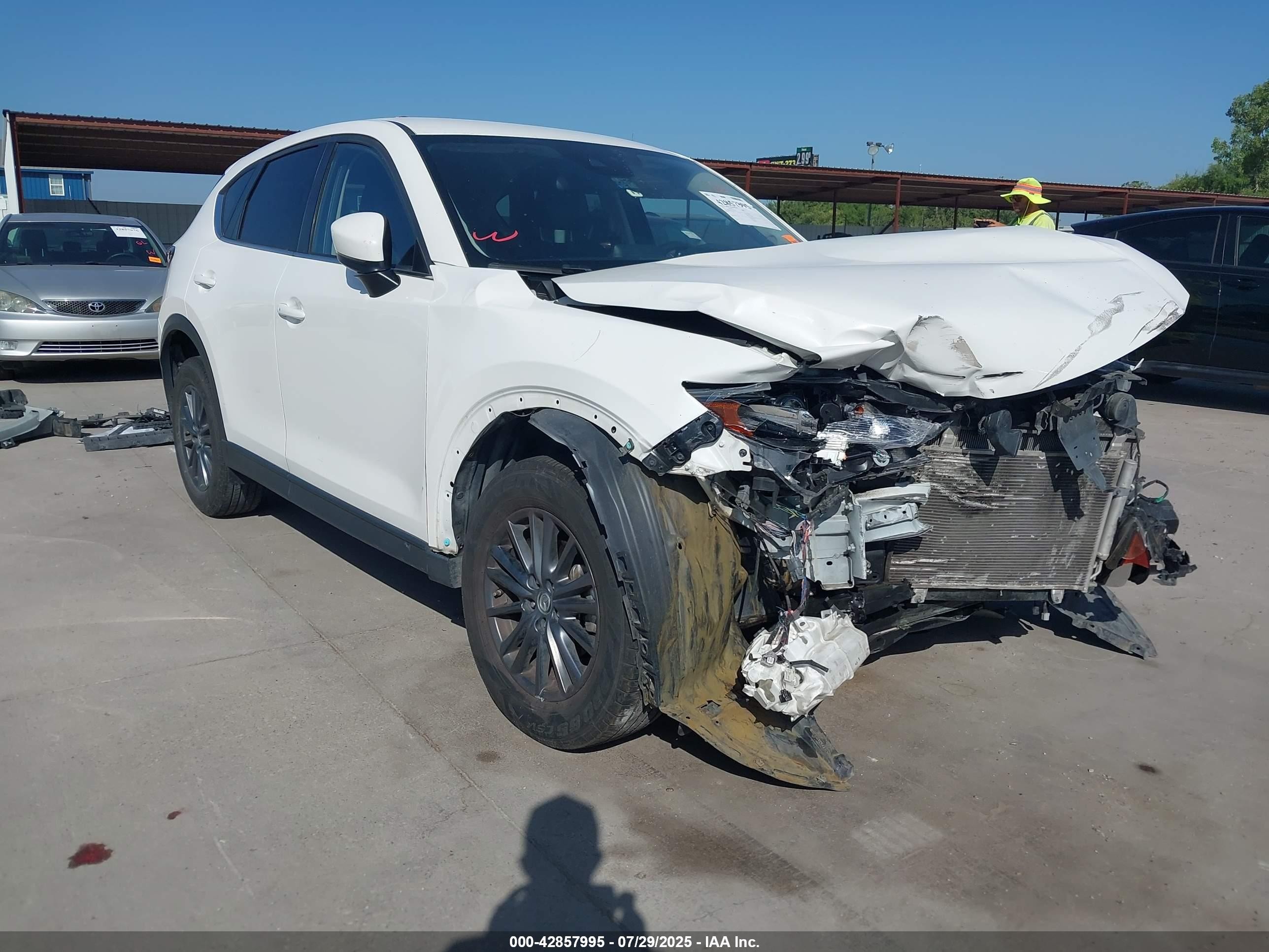 2020 Mazda CX-5 Touring, VIN JM3KFACM2L0781756 — Front end