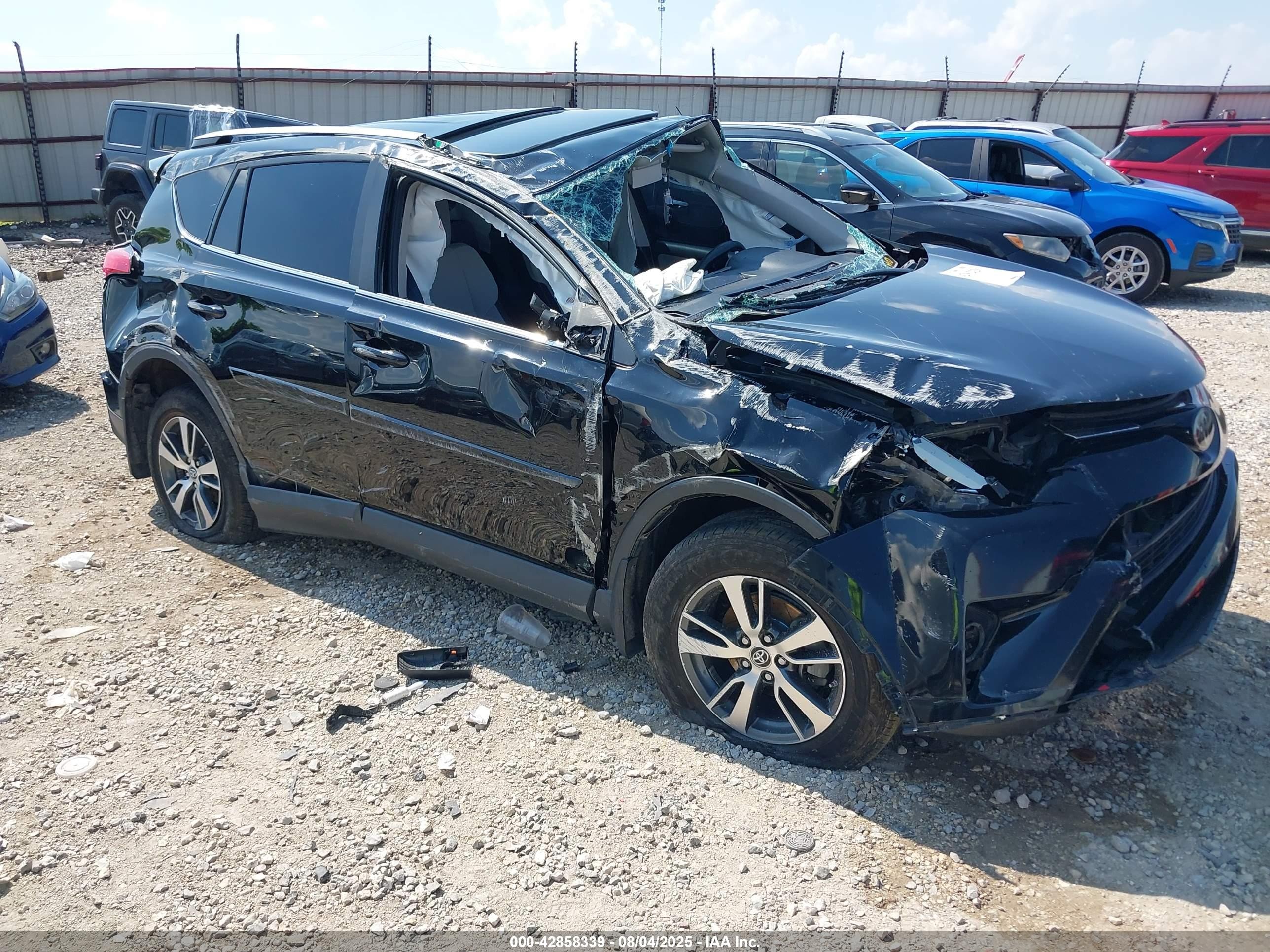 2017 Toyota RAV4 XLE, VIN 2T3WFREV9HW366130 — Rollover