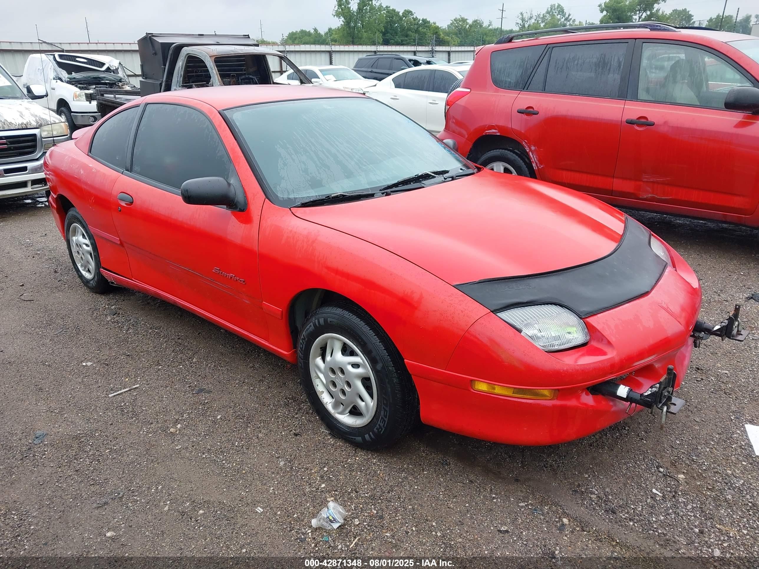 1996 Pontiac Sunfire SE, VIN 3G2JB124XTS809768 — Бок