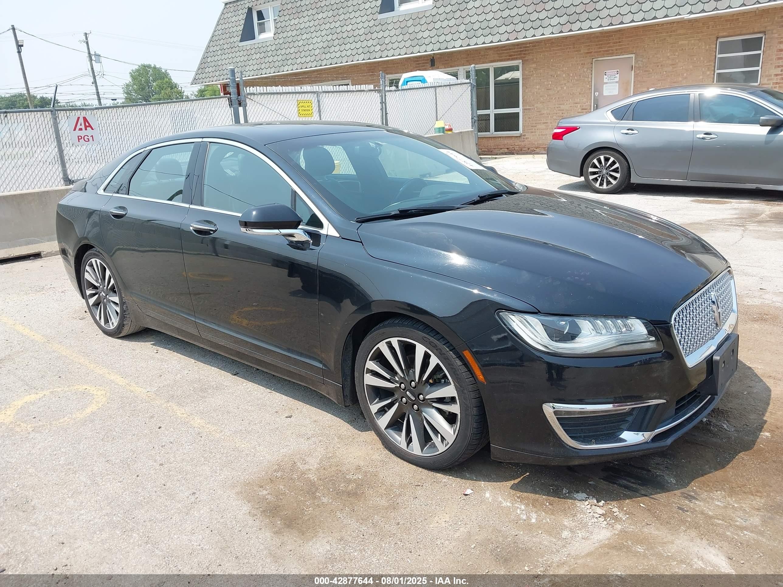 2017 Lincoln MKZ Hybrid Reserve, VIN 3LN6L5MU7HR611887 — Water / flood