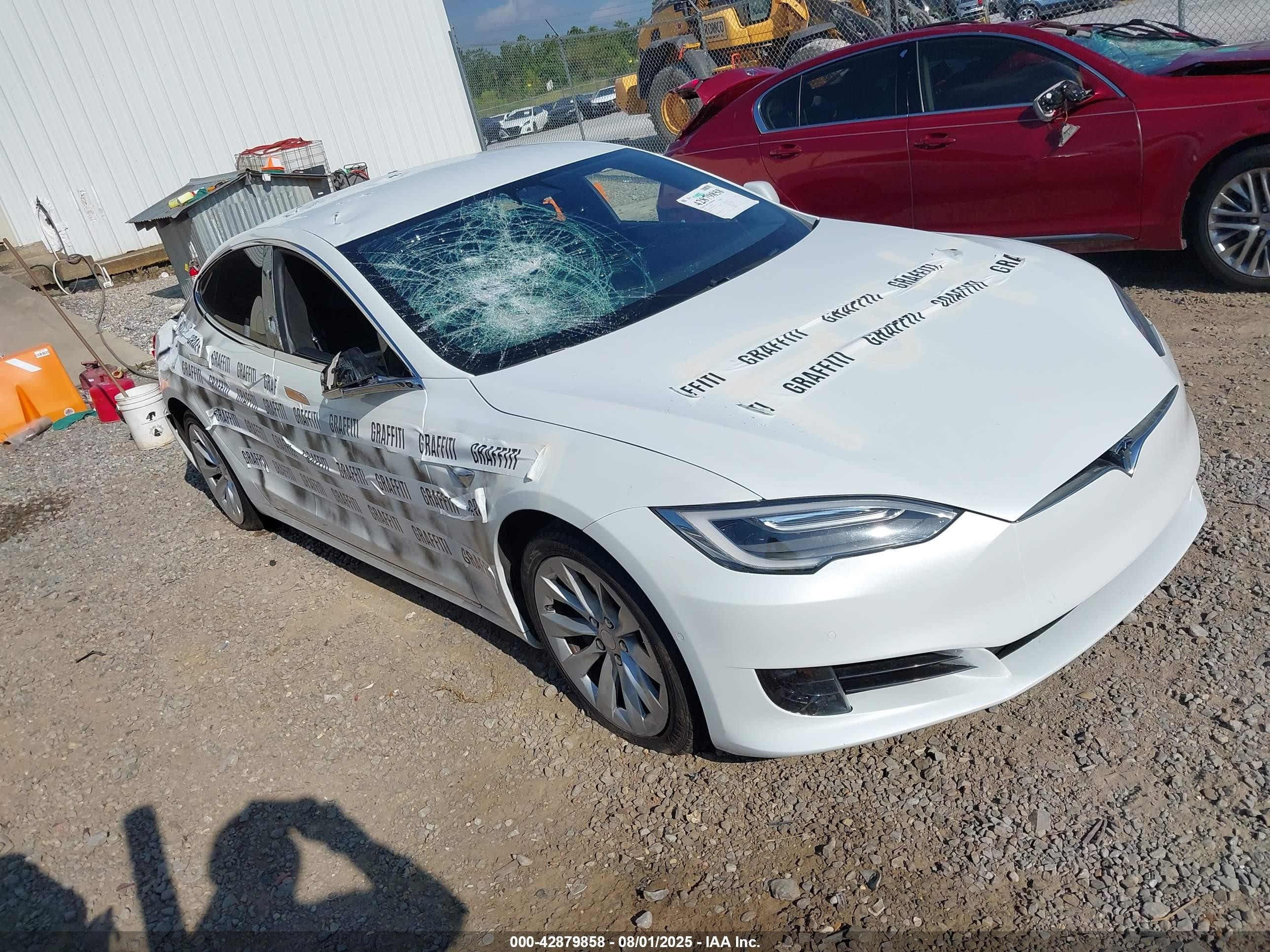 2017 Tesla Model S 100D, VIN 5YJSA1E27HF188034 — Vandalism