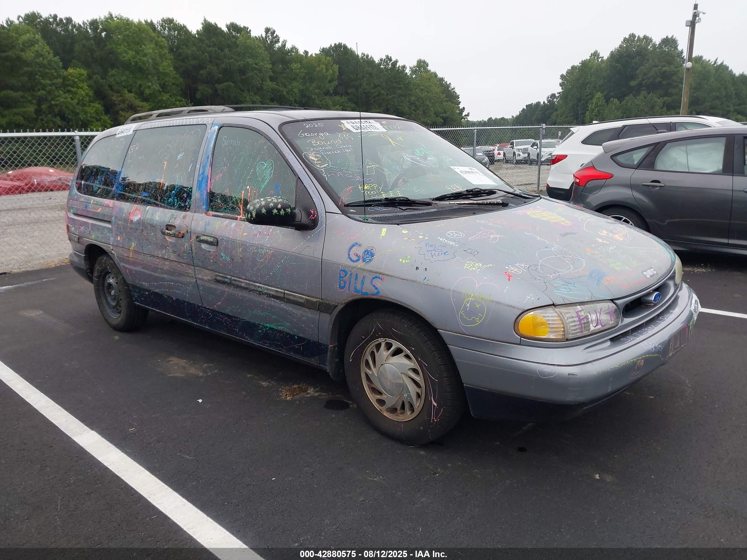 1995 Ford Windstar GL, VIN 2FMDA5147SBA64272 — Vandalism