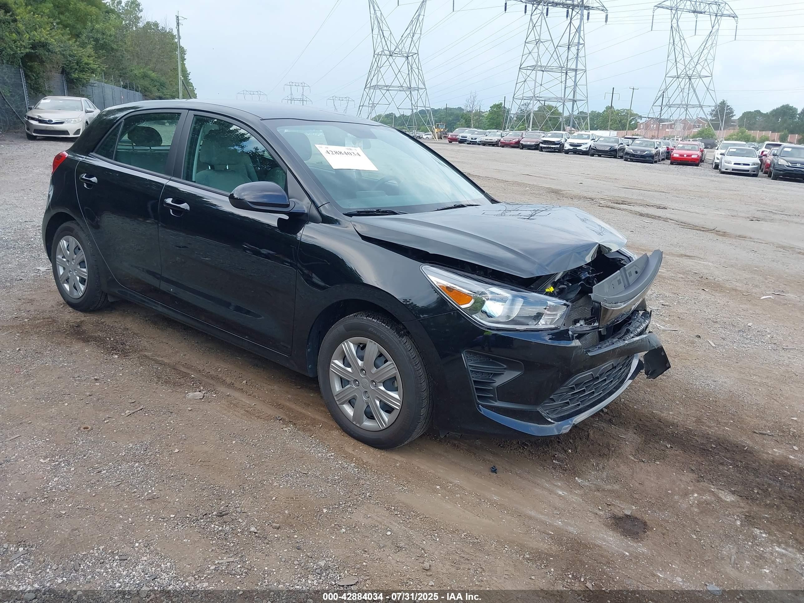 2023 Kia Rio S, VIN 3KPA25AD8PE620285 — Front end