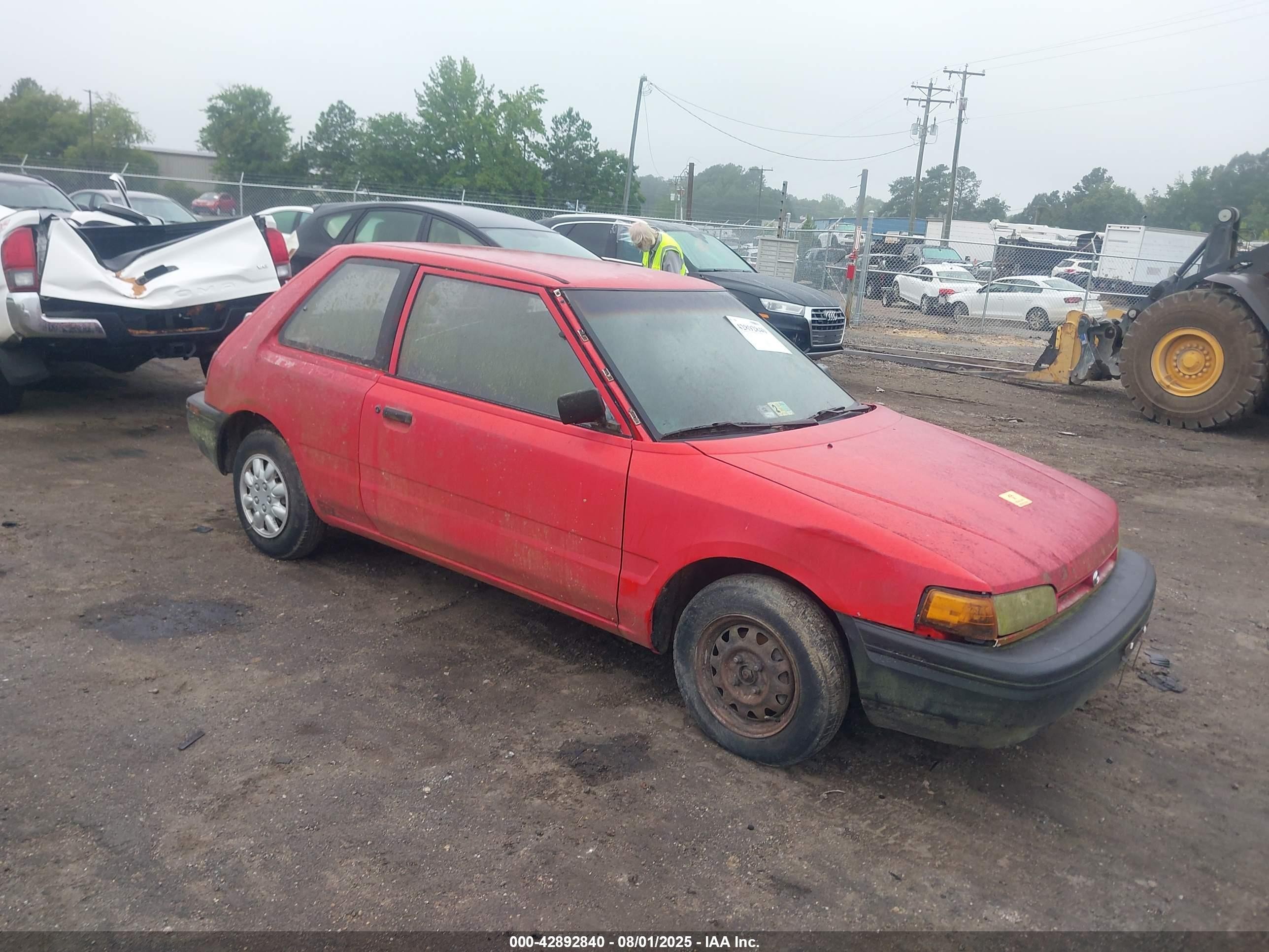 1994 Mazda 323, VIN JM1BG2329R0803058 — Front end