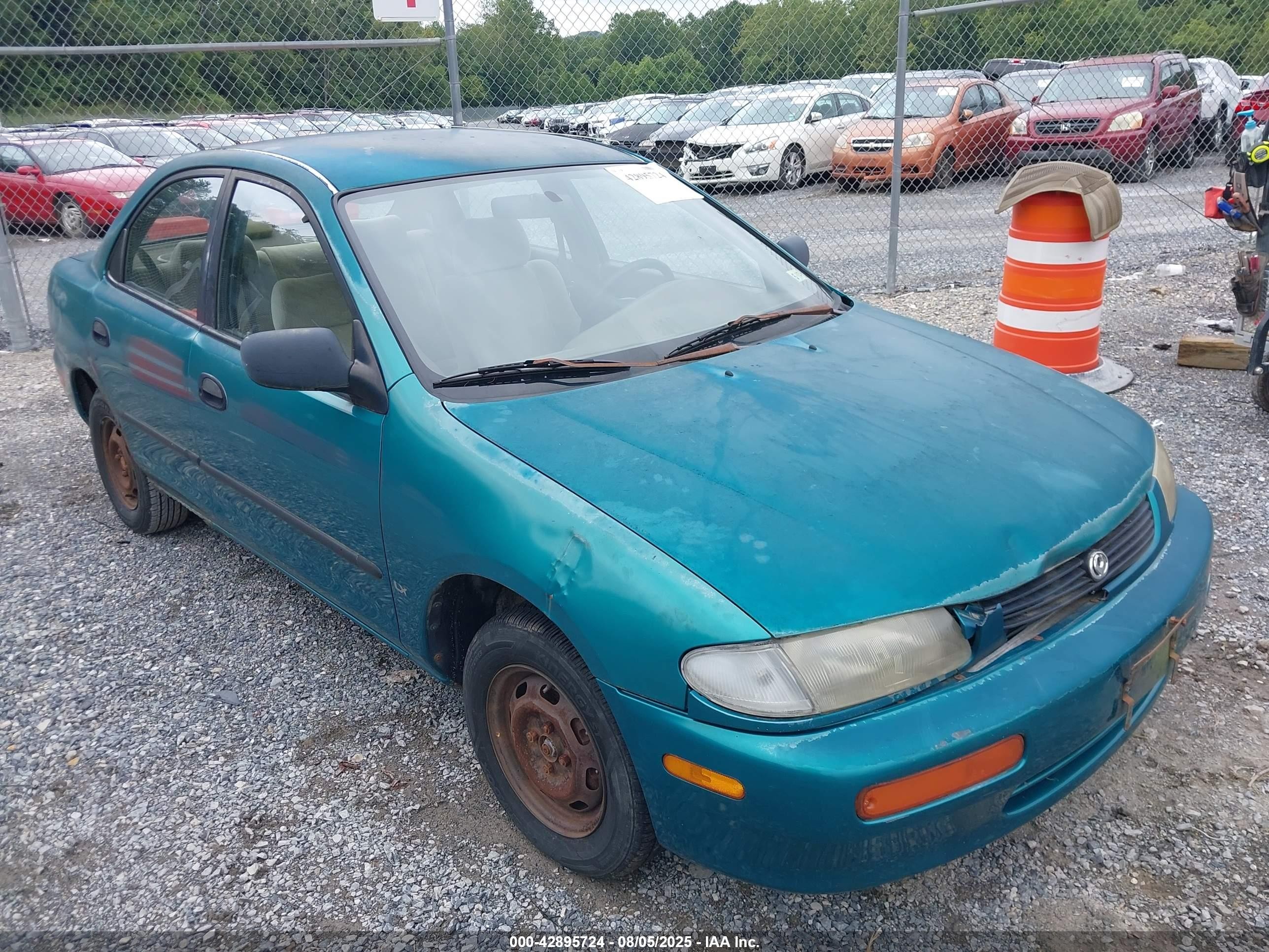 1995 Mazda Protege, VIN JM1BA1415S0181226 — Перед