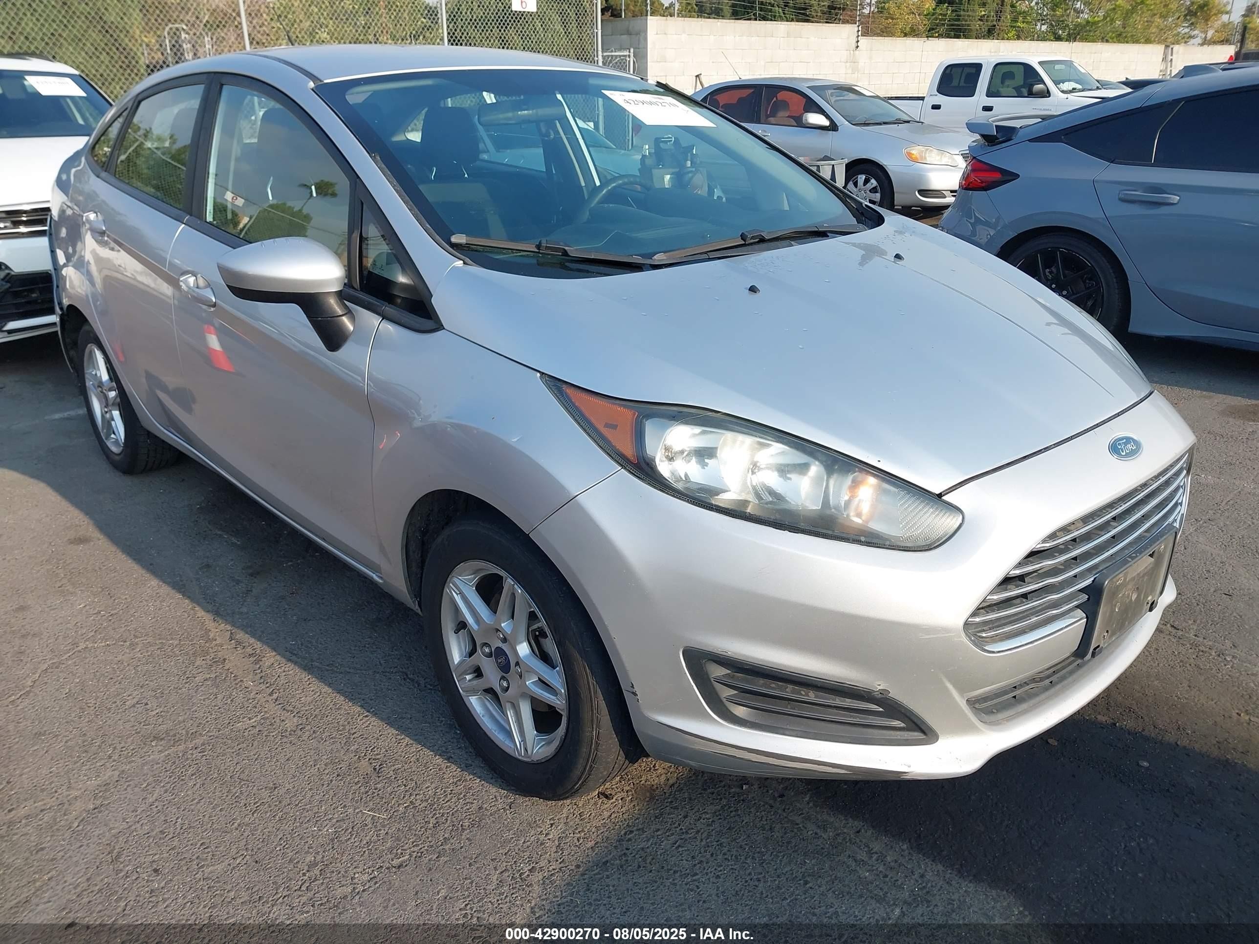 2017 Ford Fiesta SE, VIN 3FADP4BJ5HM135239 — Rear end