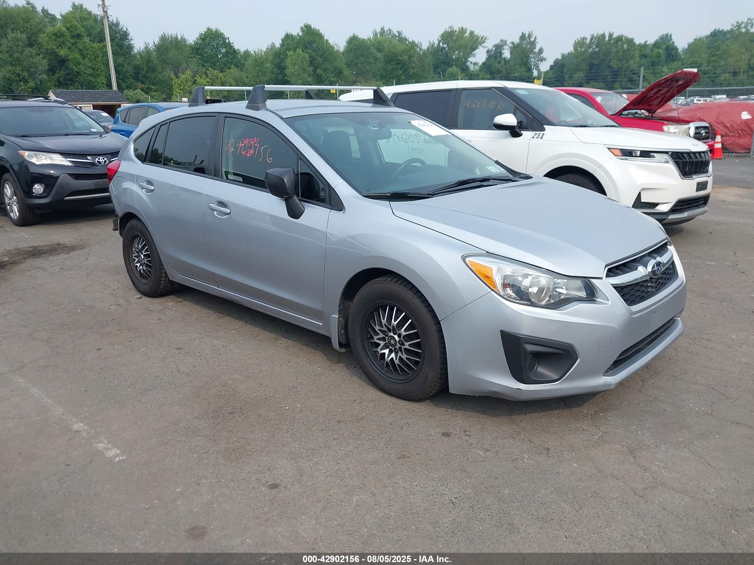 2013 Subaru Impreza 2.0i, VIN JF1GPAA66DH211929 — Rear end