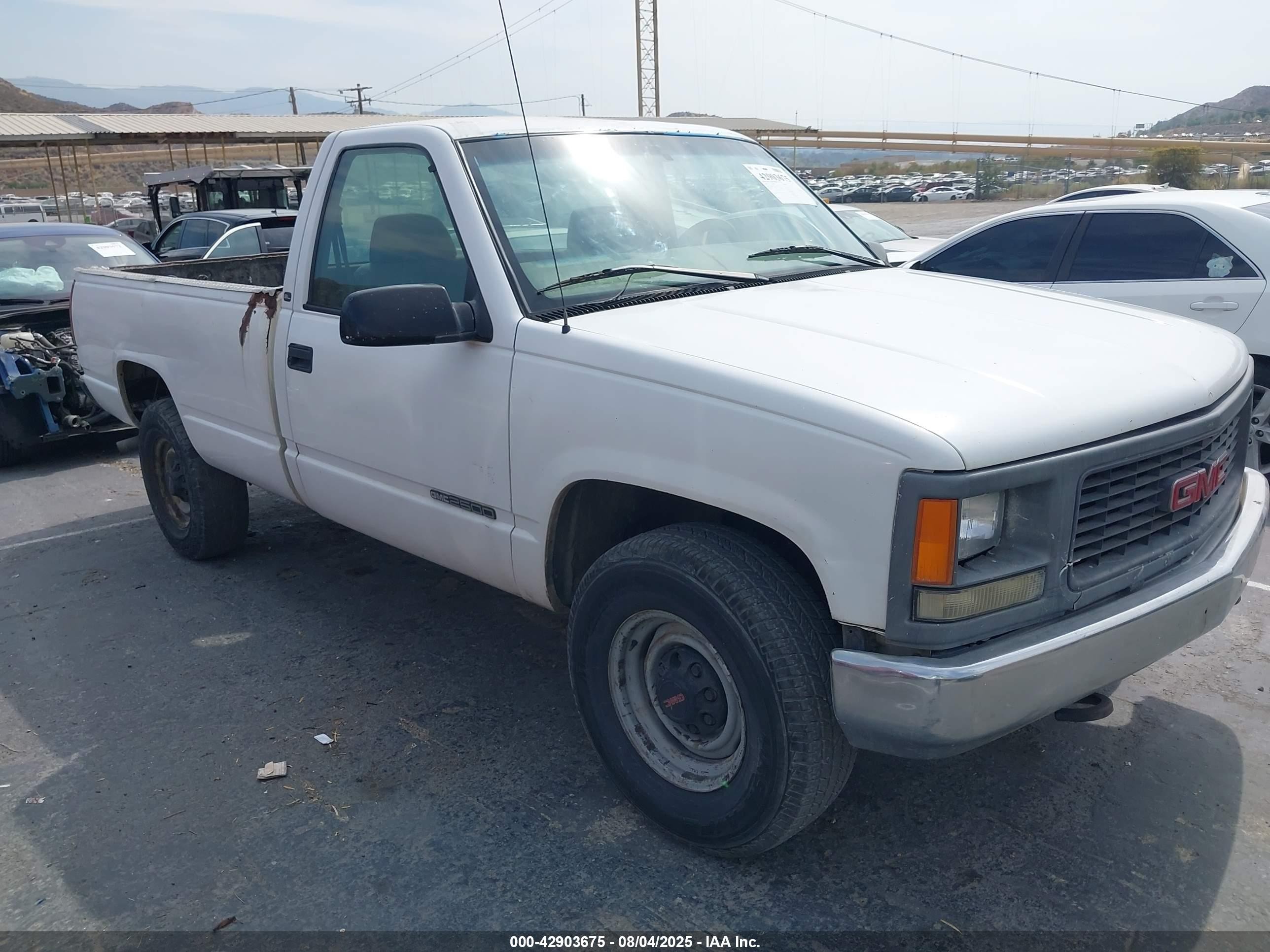 1997 GMC Sierra 2500, VIN 1GTGC24R7VE555709 — Side