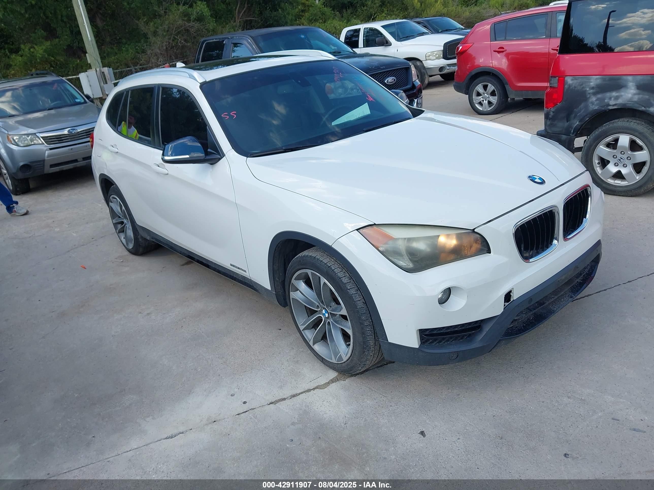 2014 BMW X1 sDrive28i, VIN WBAVM1C52EVW50110 — Normal wear