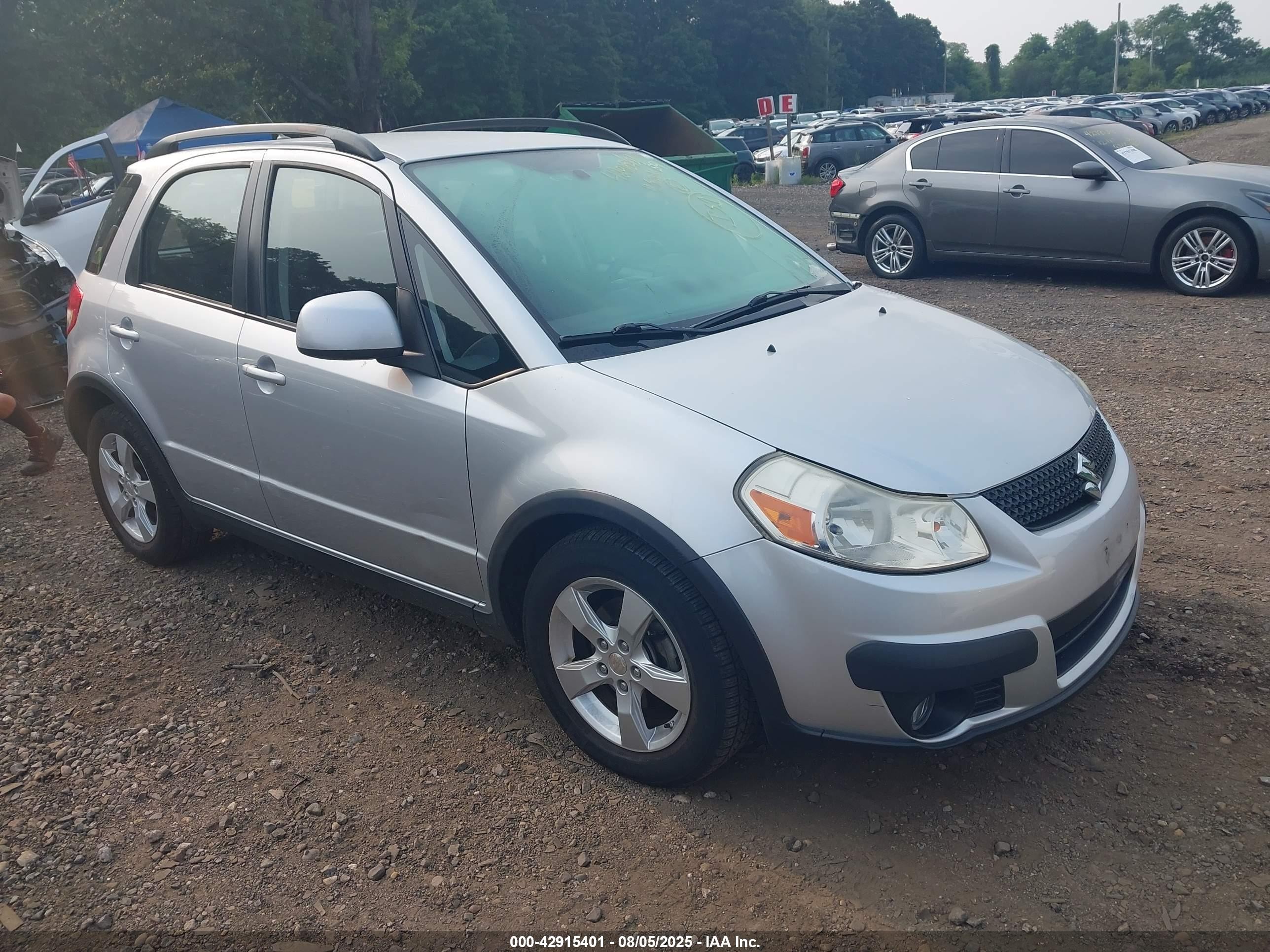 2011 Suzuki SX4 Crossover, VIN JS2YB5A36B6303423 — Вода / потоп
