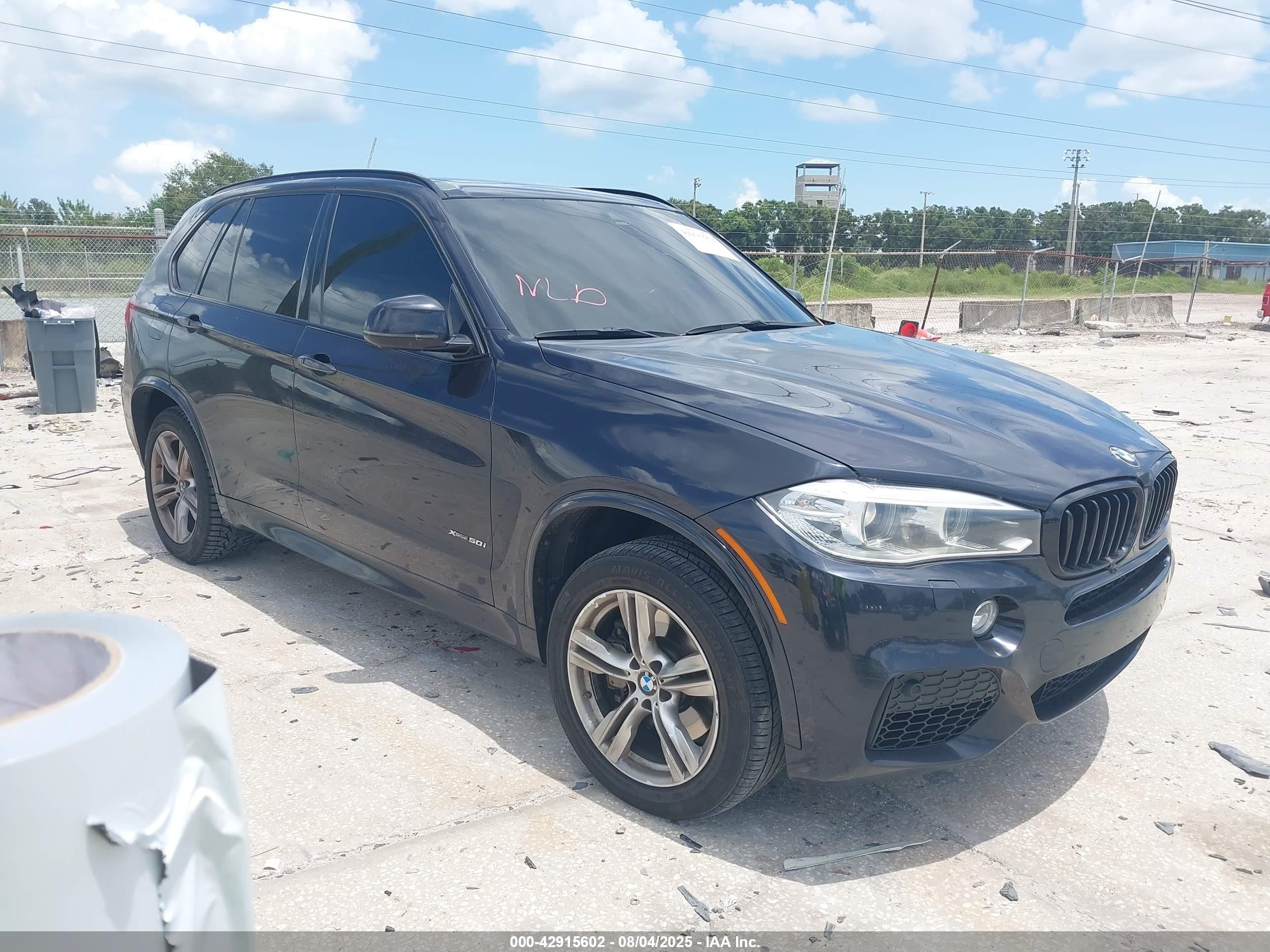 2014 BMW X5 xDrive50i, VIN 5UXKR6C56E0C02293 — Storm