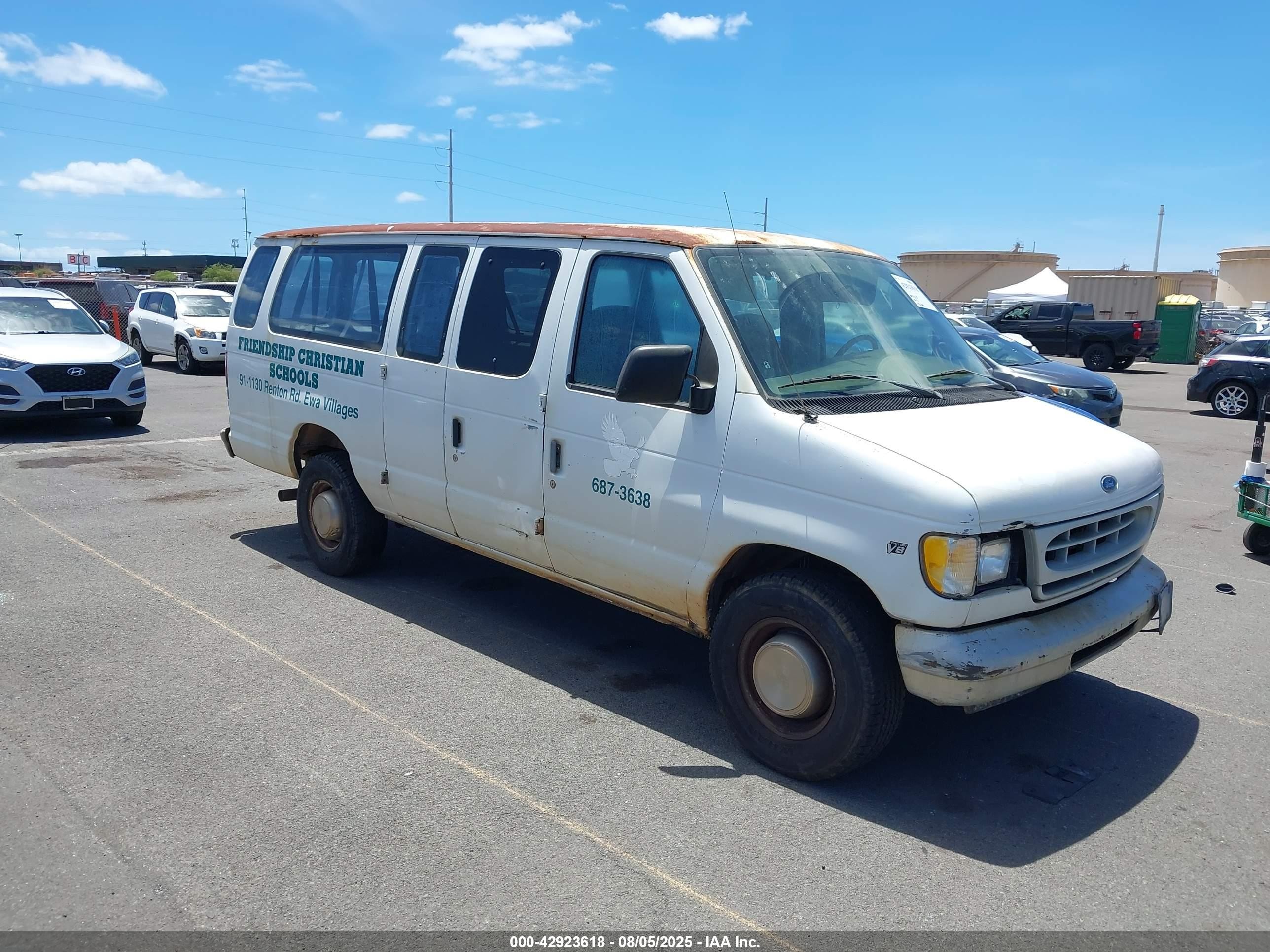 1998 Ford Econoline Wagon XL, VIN 1FBSS31L4WHC07180 — Normal wear