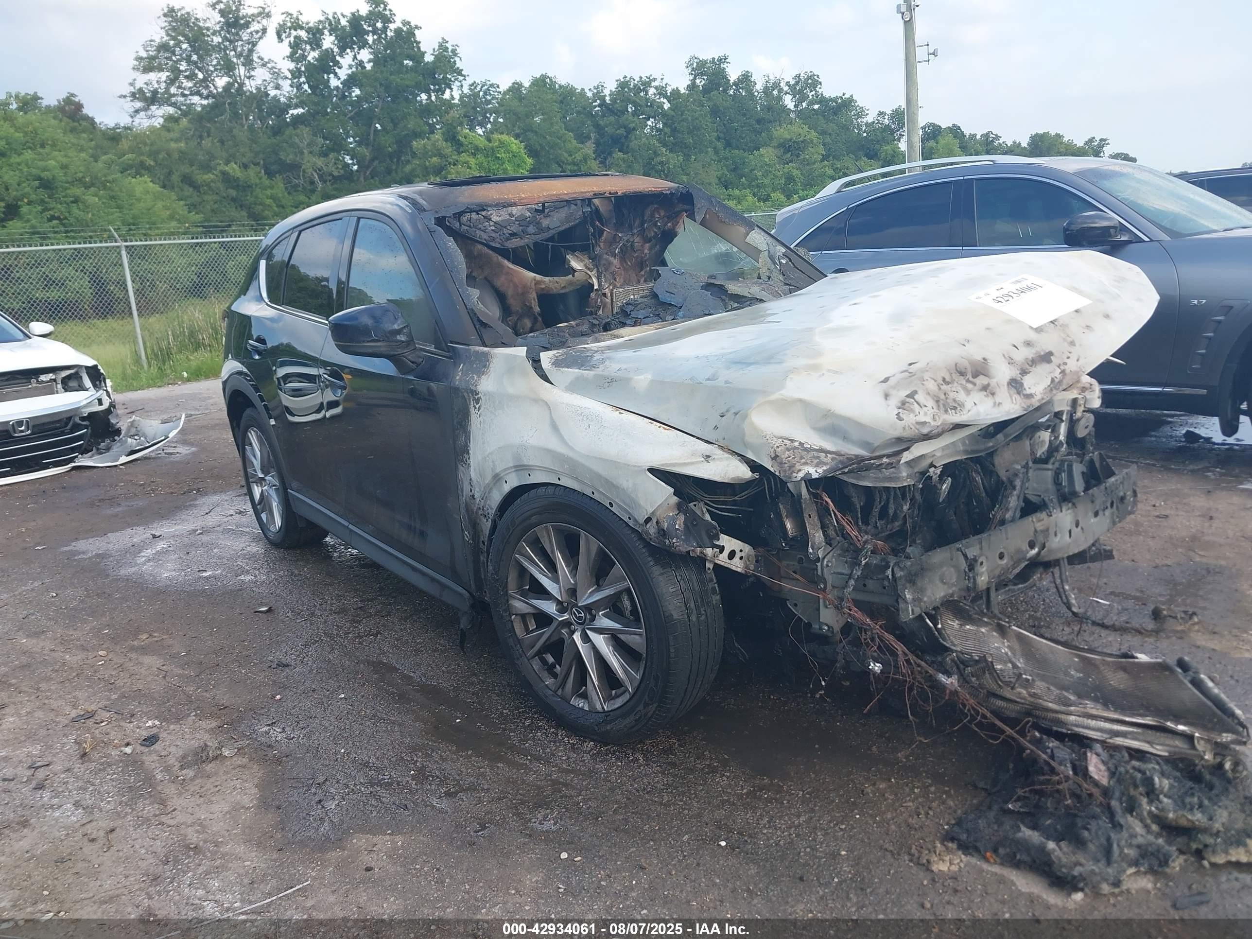 2021 Mazda CX-5 Grand Touring, VIN JM3KFADM7M0381854 — Engine fire