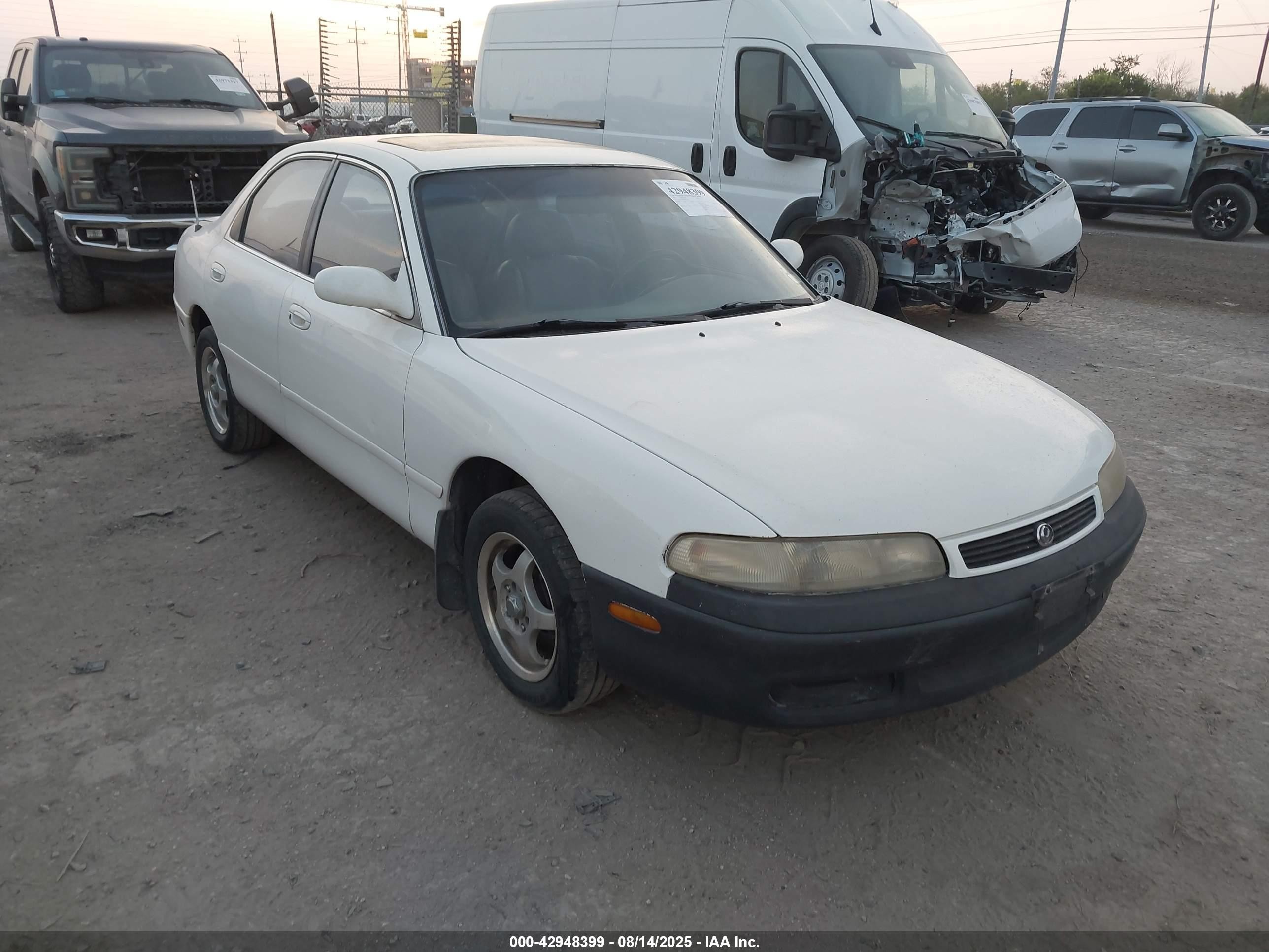 1995 Mazda 626 DX, VIN 1YVGE22CXS5392200 — Зад