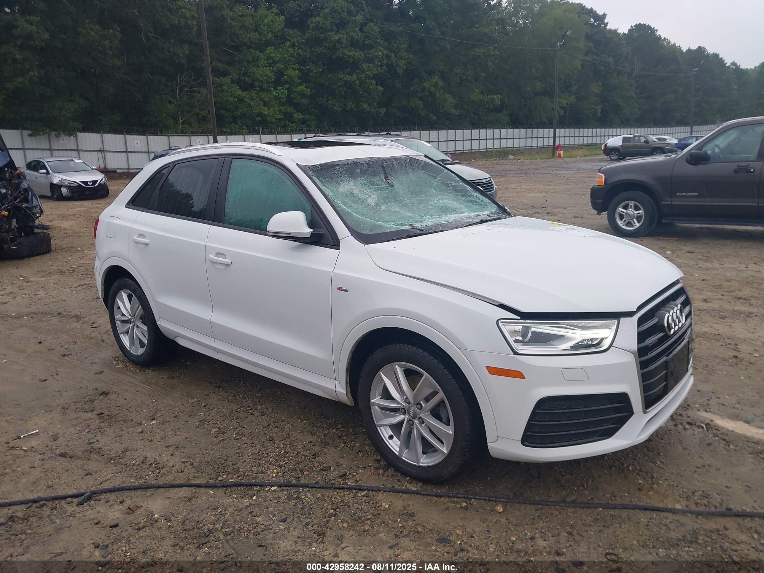 2018 Audi Q3 Premium, VIN WA1ECCFS9JR022903 — Storm