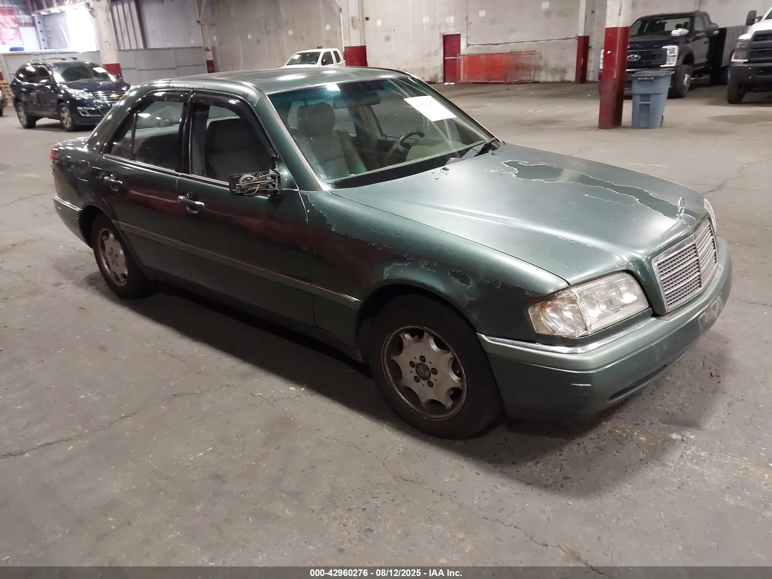 1994 Mercedes-Benz C, VIN WDBHA28E4RF061954 — Side