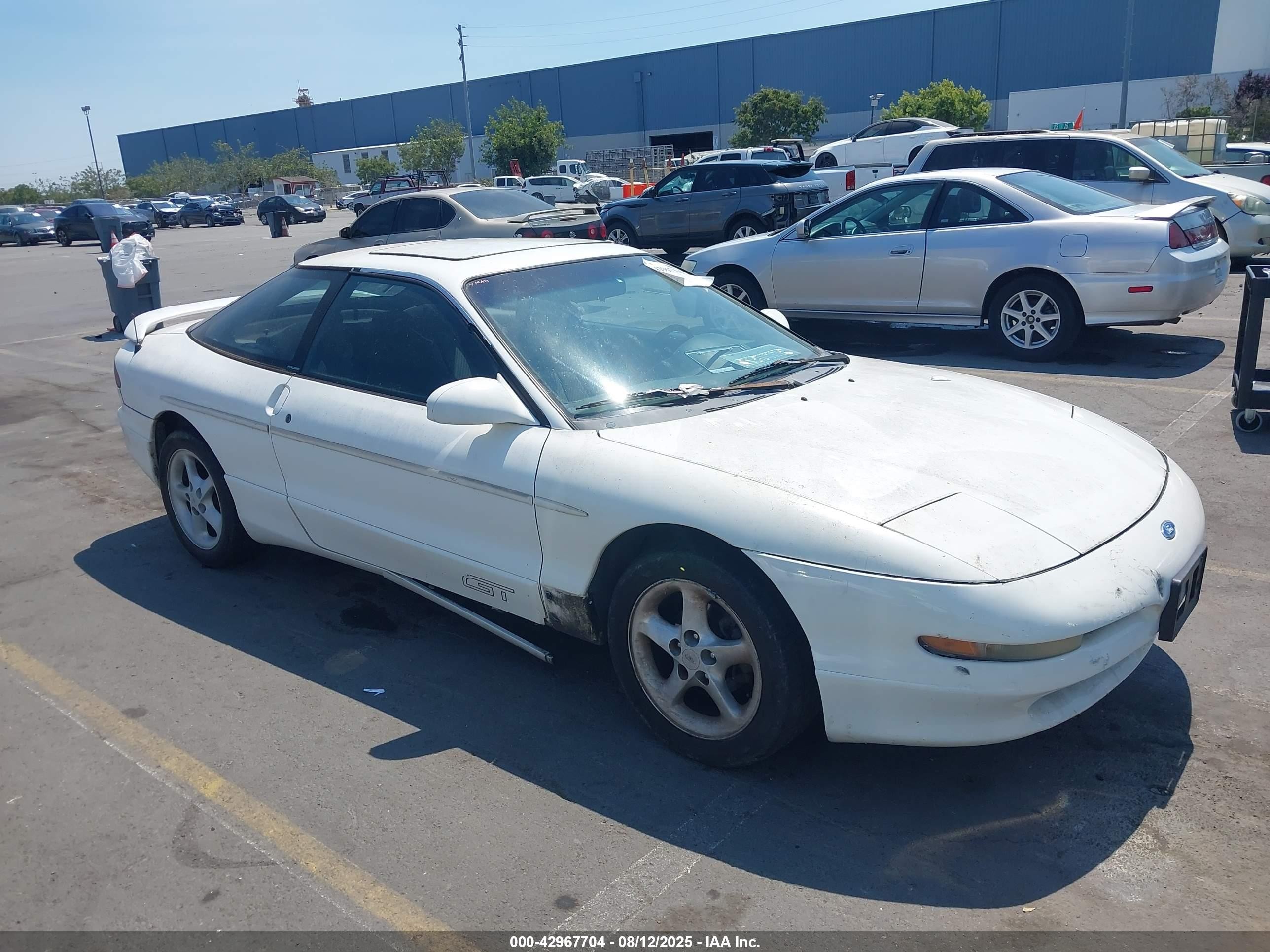 1994 Ford Probe, VIN 1ZVLT22B1R5136875 — Side
