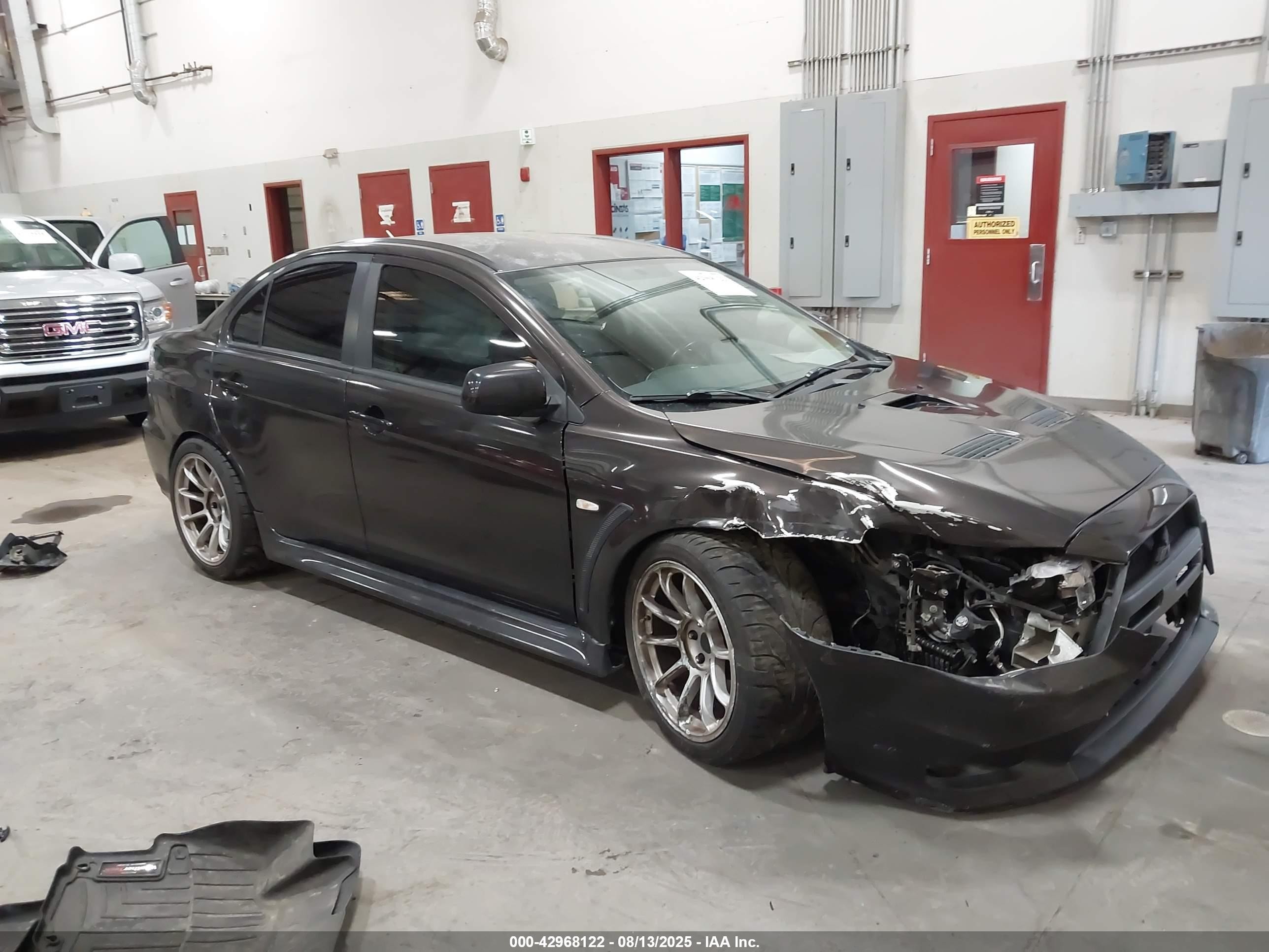 2013 Mitsubishi Lancer Evolution GSR, VIN JA32W8FV8DU009230 — Front end