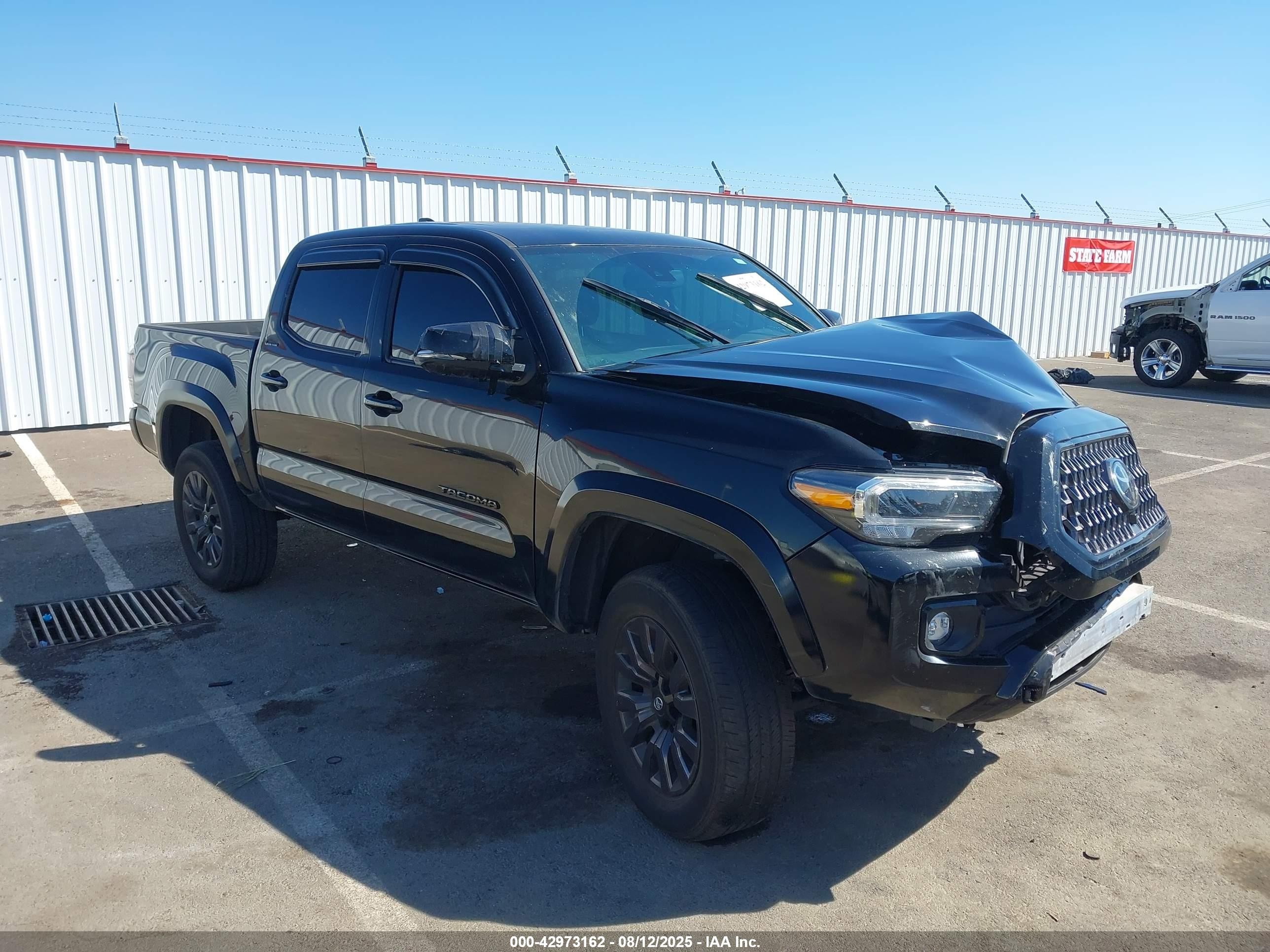 2023 Toyota Tacoma Limited, VIN 3TMGZ5AN8PM618167 — Front end
