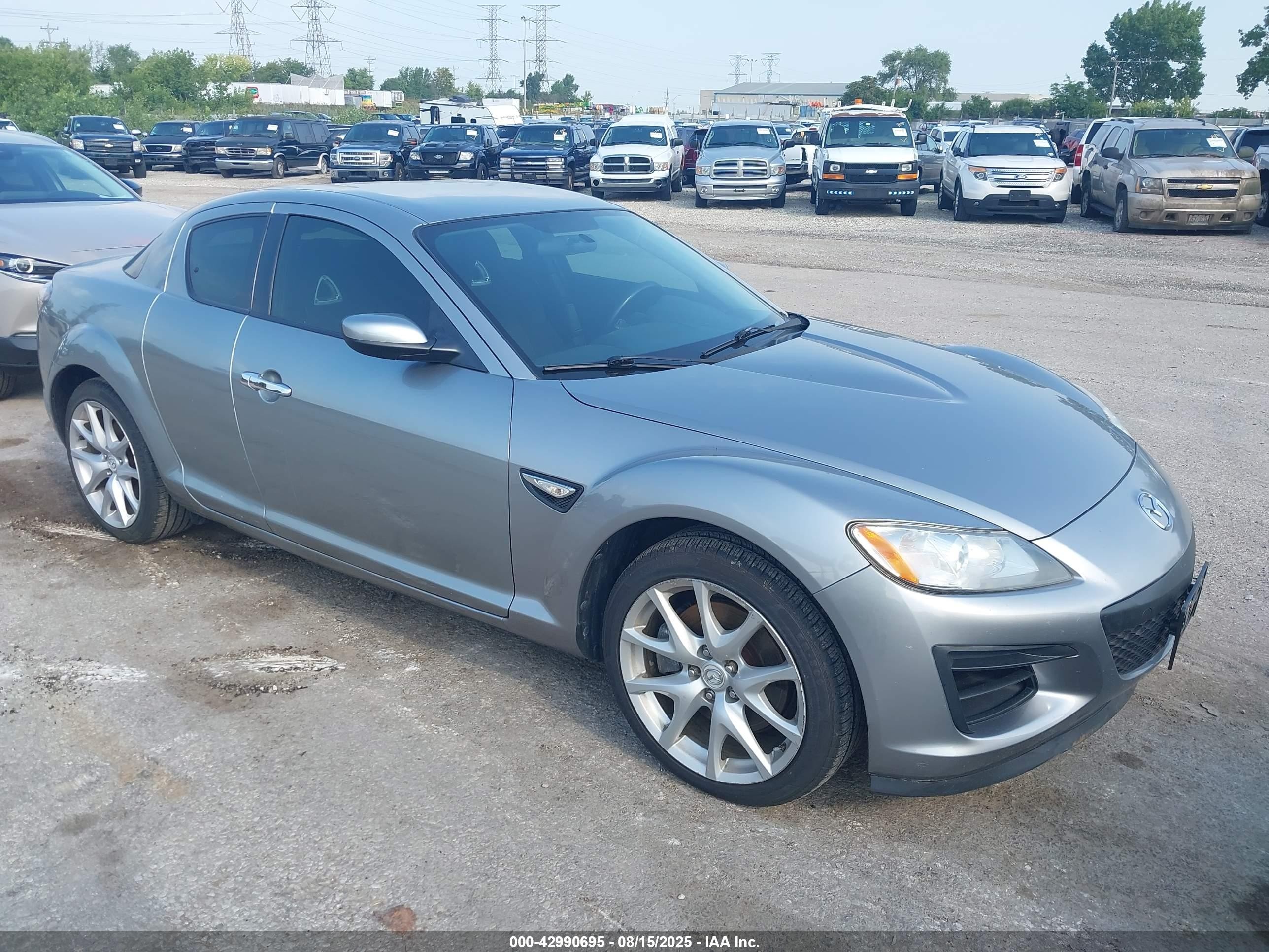 2010 Mazda RX-8, VIN JM1FE1CP3A0404339 — Side