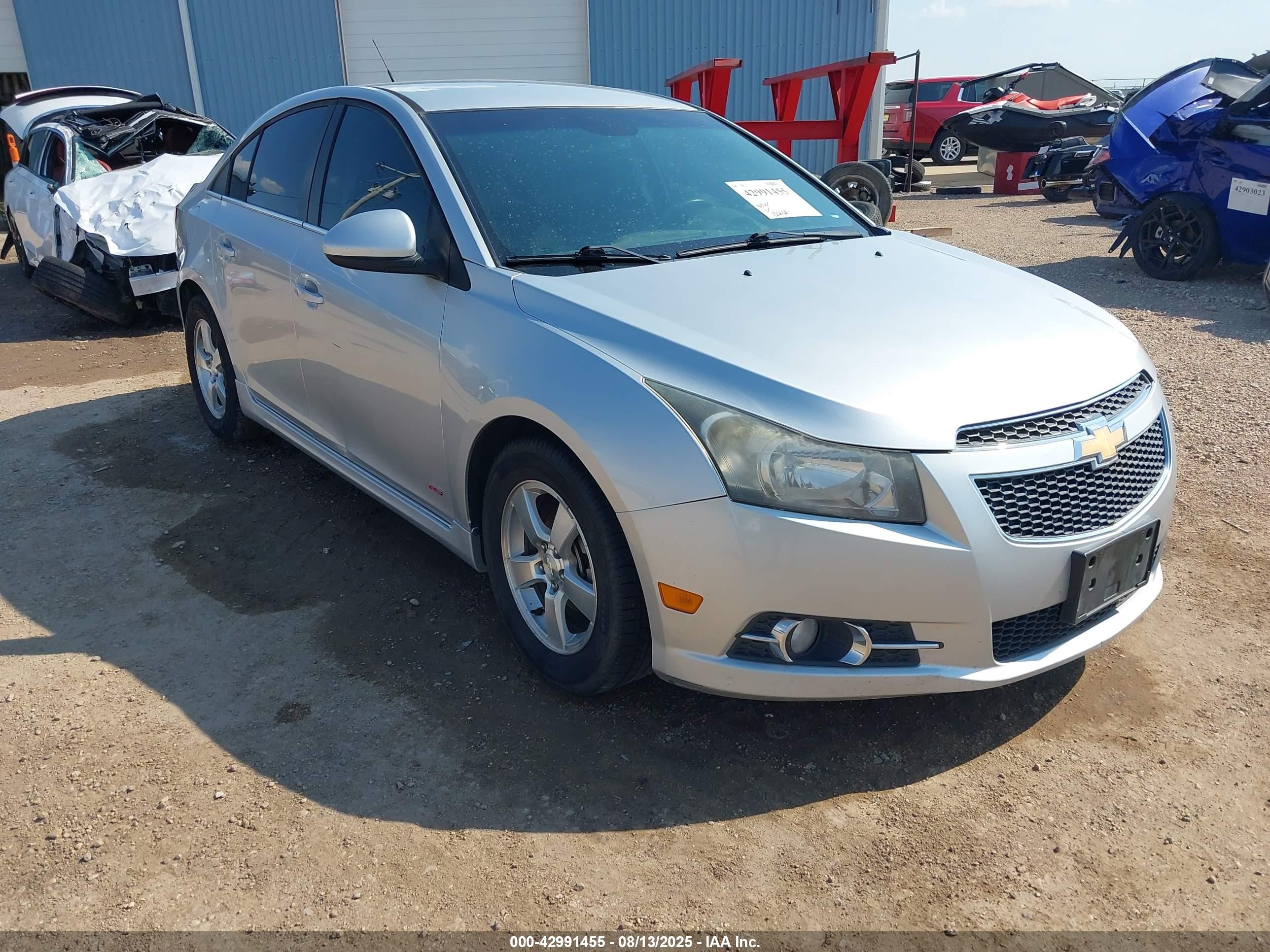 2014 Chevrolet Cruze 1LT, VIN 1G1PC5SB7E7143729 — Side
