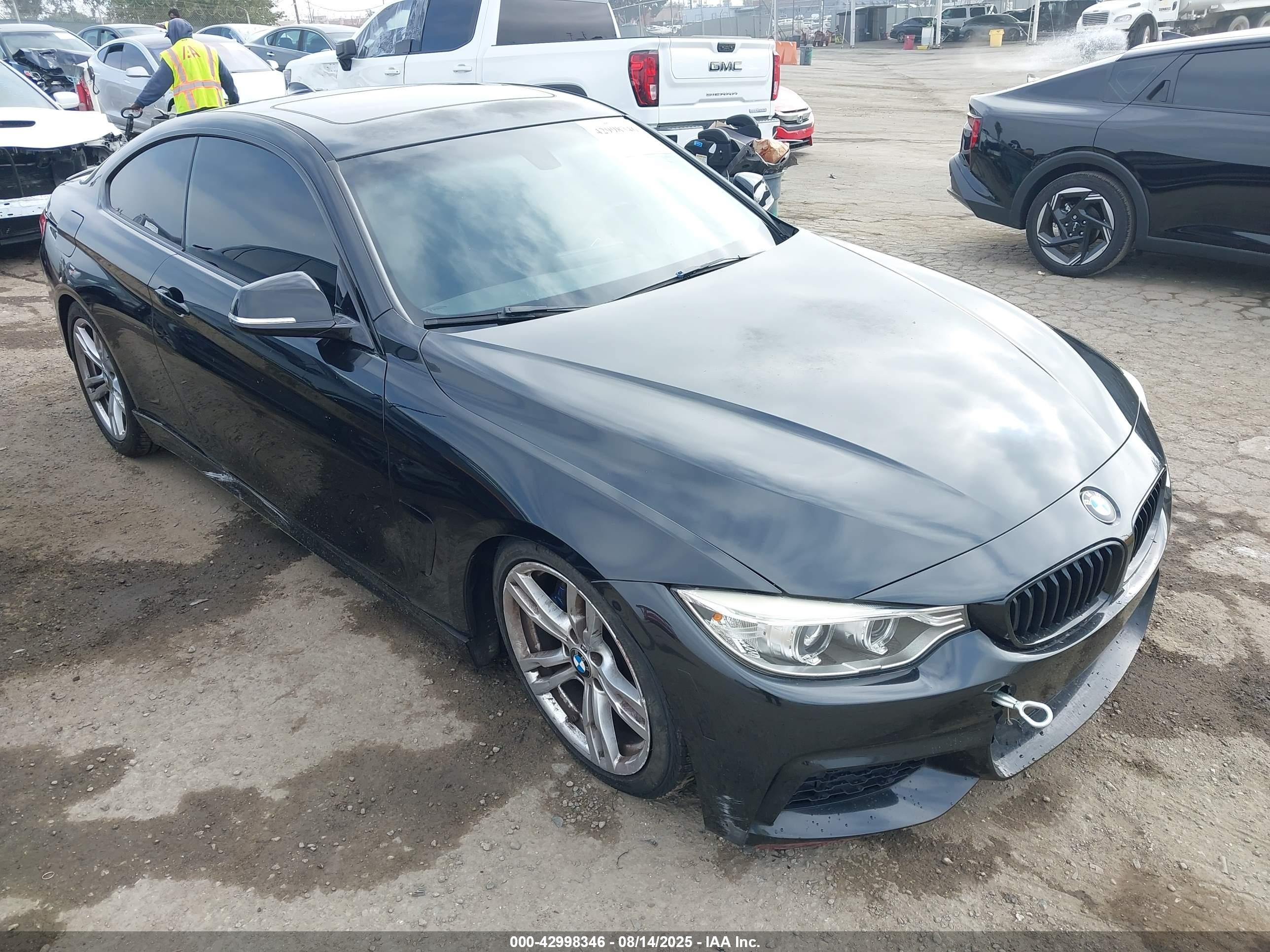 2014 BMW 4 Series 428i, VIN WBA3N7C57EF719682 — Side