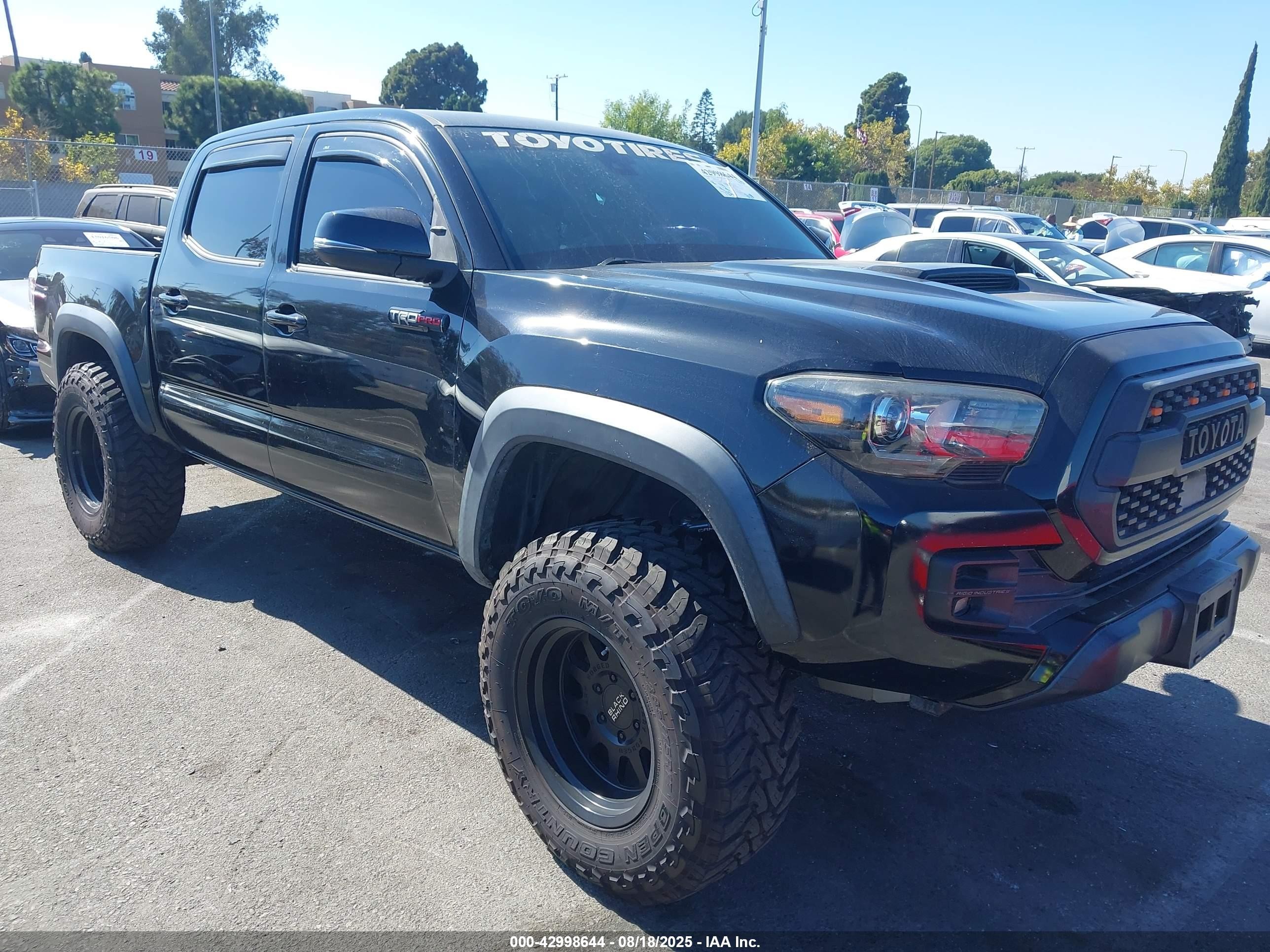 2019 Toyota Tacoma SR, VIN 5TFCZ5AN6KX184090 — Rear end