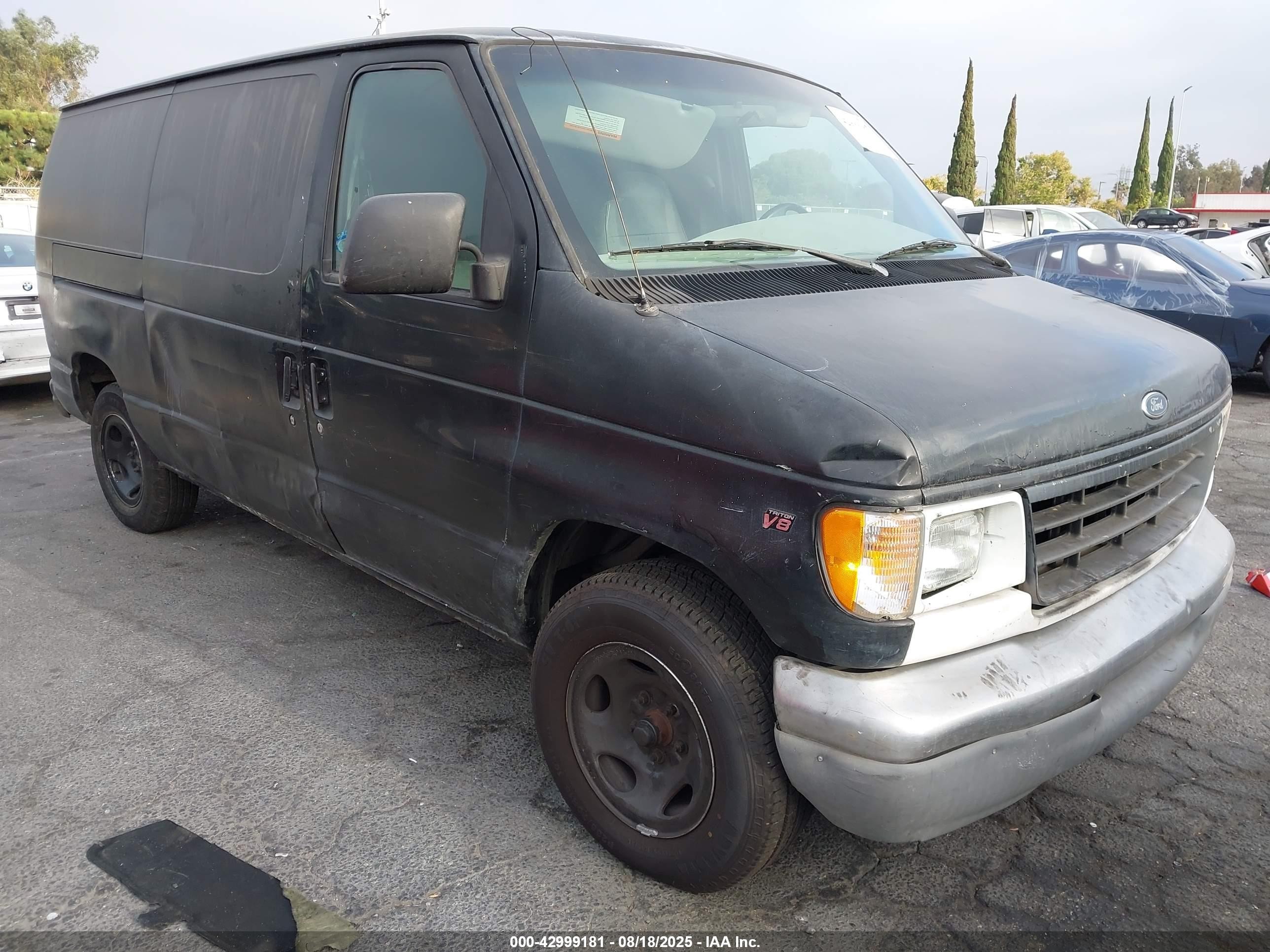 1997 Ford E-150, VIN 1FTEE14L7VHA43244 — Бок