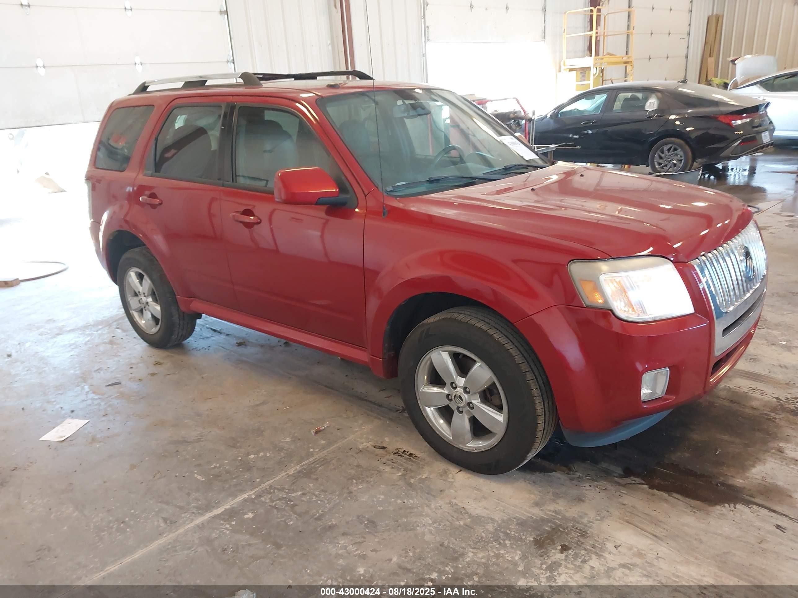 2011 Mercury Mariner Premier, VIN 4M2CN8HGXBKJ06018 — Undercarriage