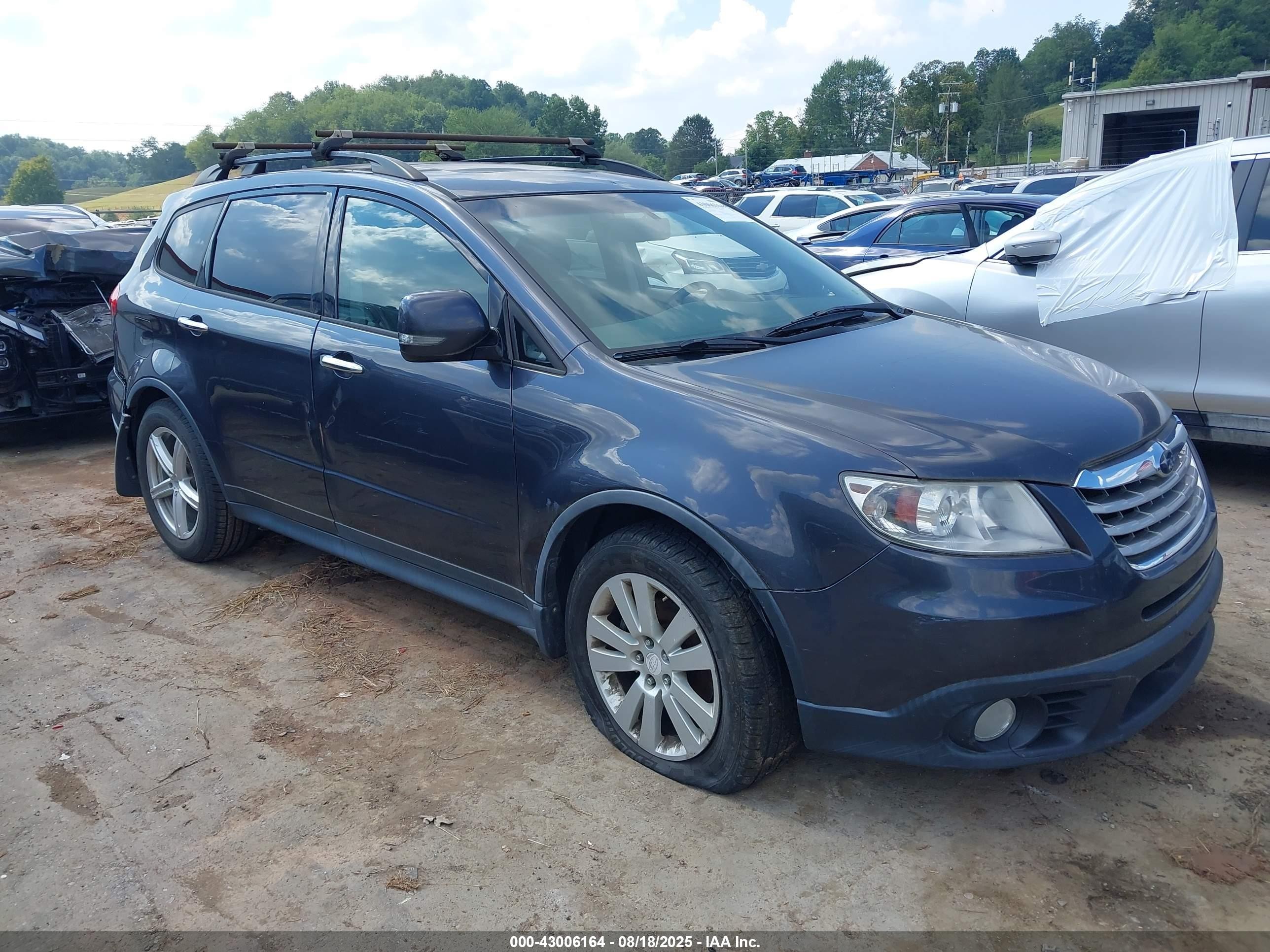 2011 Subaru Tribeca Limited, VIN 4S4WX9GD1B4400899 — Зад