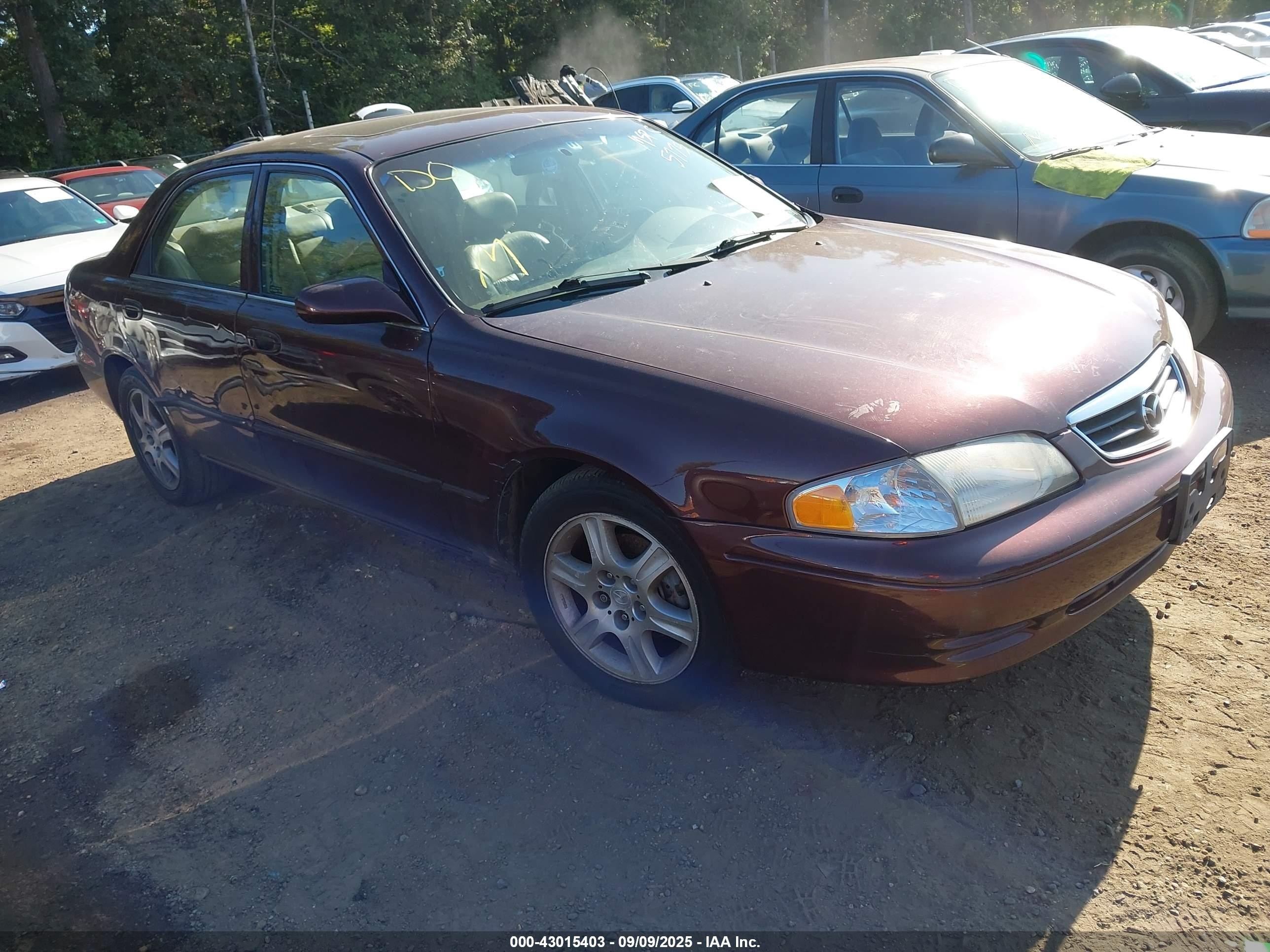 2001 Mazda 626 LX, VIN 1YVGF22D915205775 — Перед