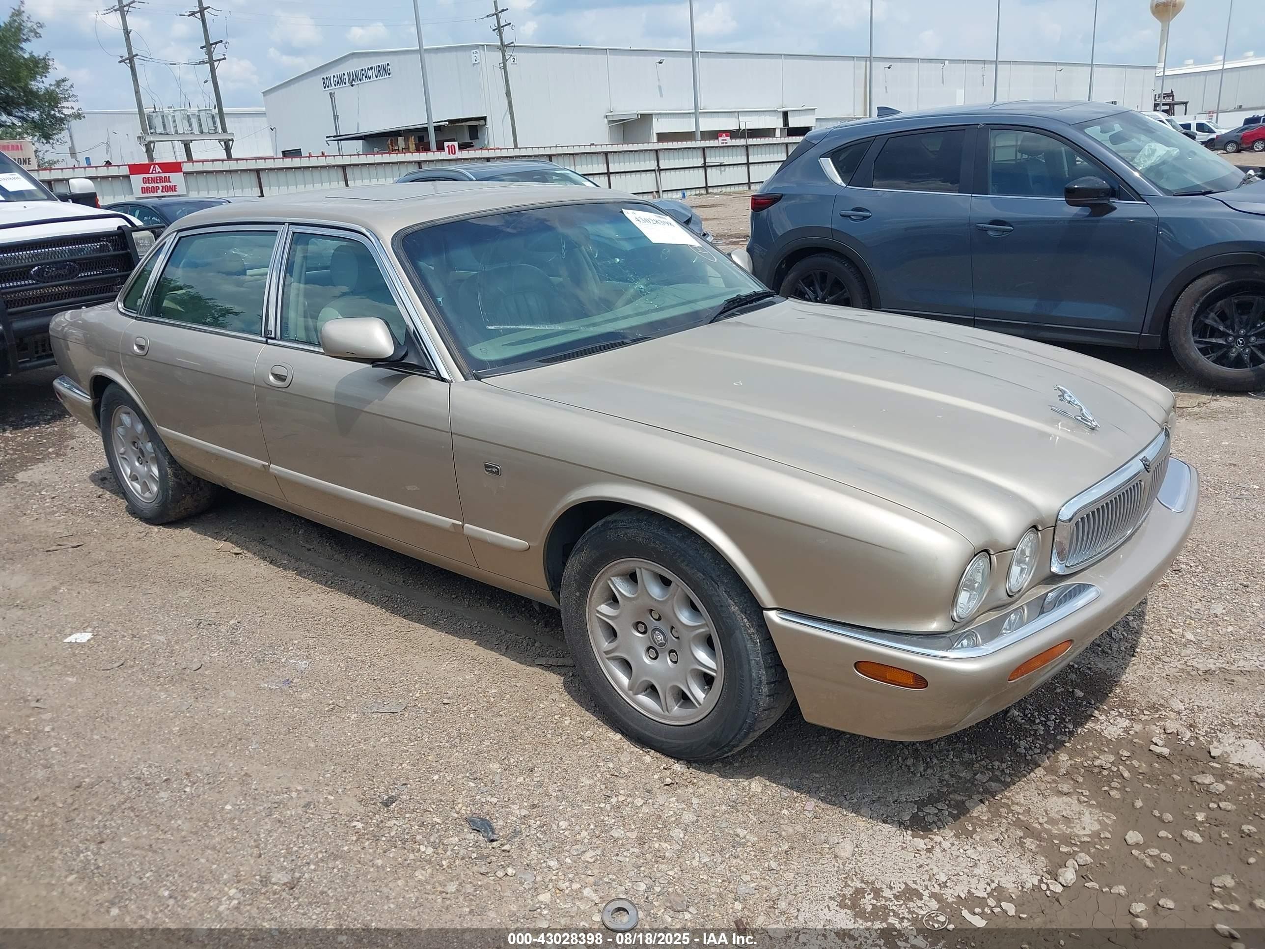 1999 Jaguar XJ, VIN SAJHD604XXC869681 — Hail