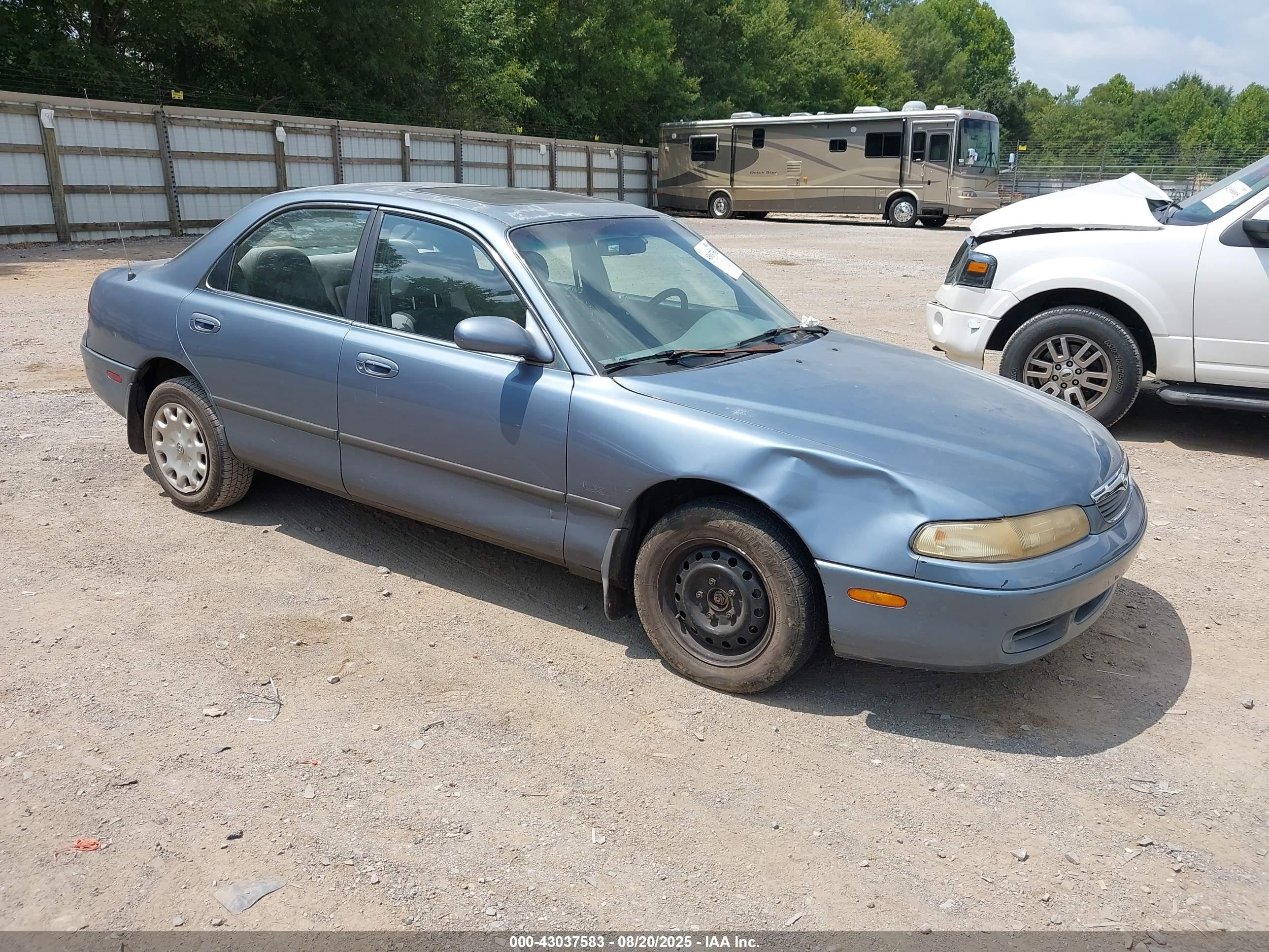 1997 Mazda 626 DX, VIN 1YVGE22CXV5664944 — Front end