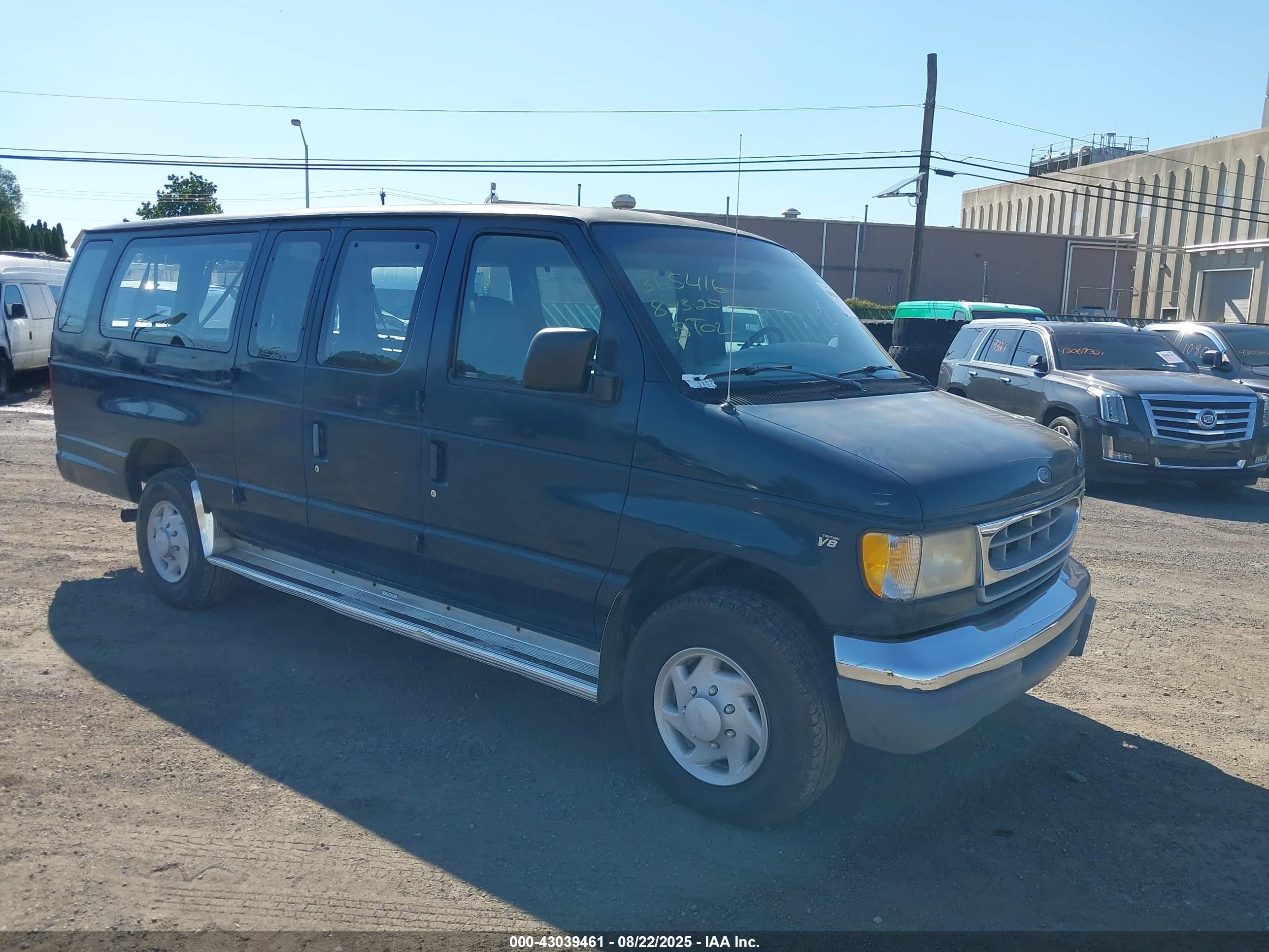 1998 Ford Econoline Wagon XL, VIN 1FBSS31LXWHA41781 — Theft recovery