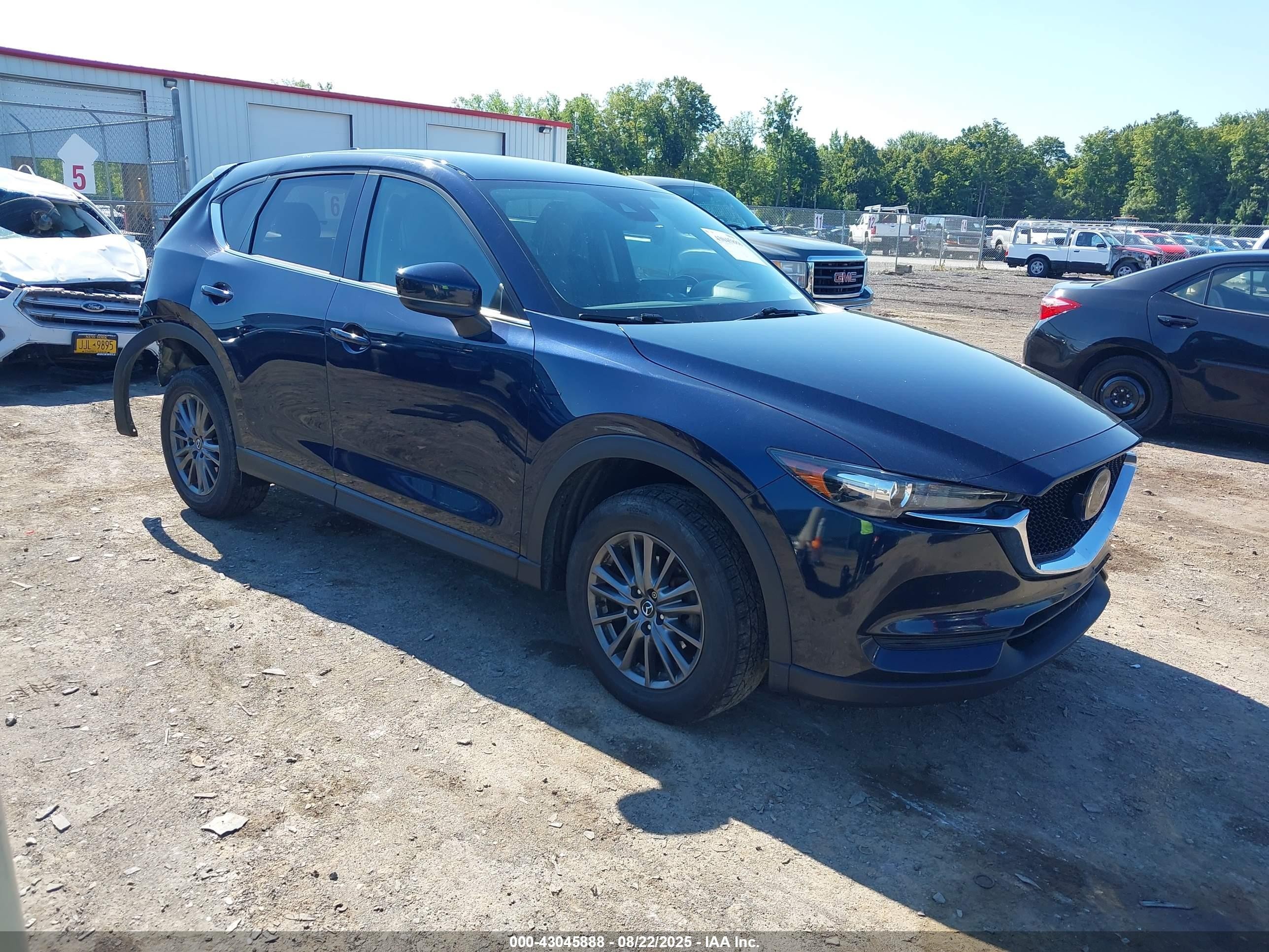 2021 Mazda CX-5 Touring, VIN JM3KFBCM2M0394437 — Rear end