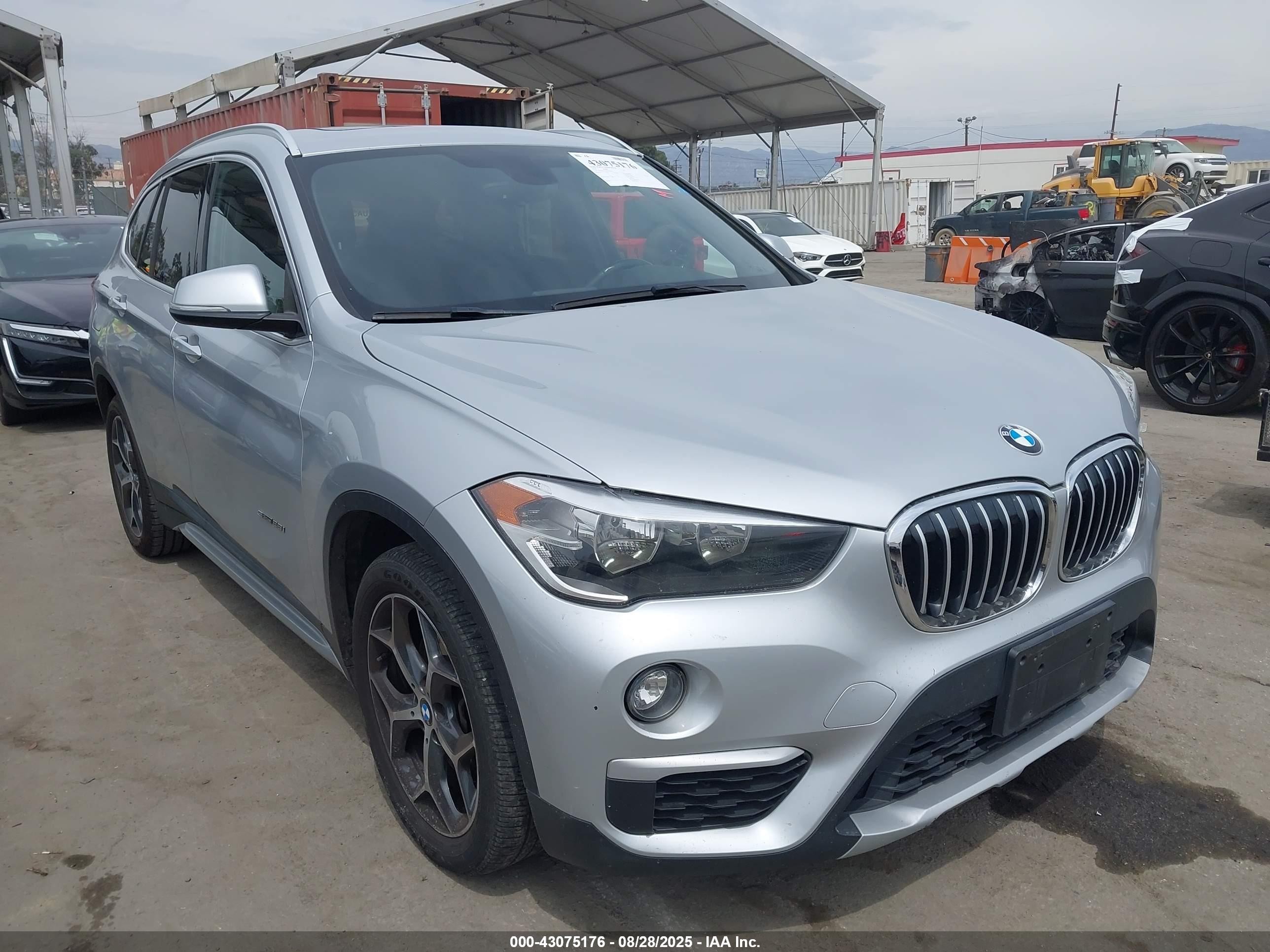 2018 BMW X1 sDrive28i, VIN WBXHU7C34J5H41848 — Front end