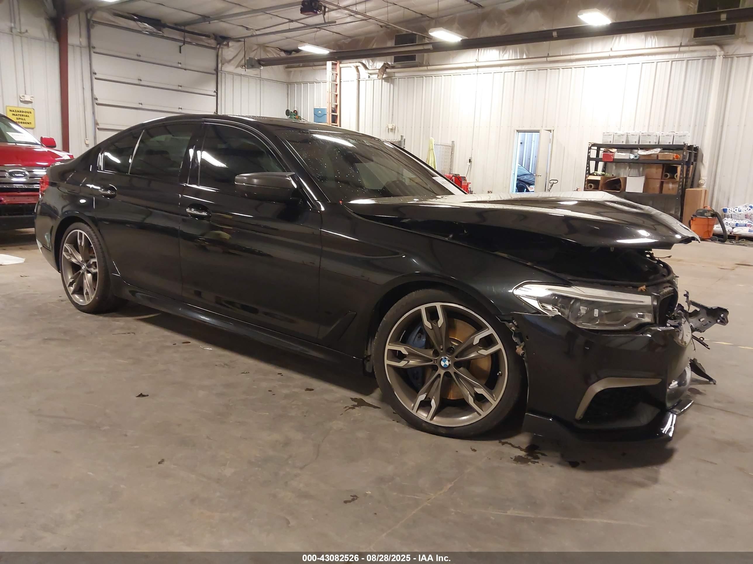 2018 BMW 5 Series M550i xDrive, VIN WBAJB9C54JB286870 — Auction photo