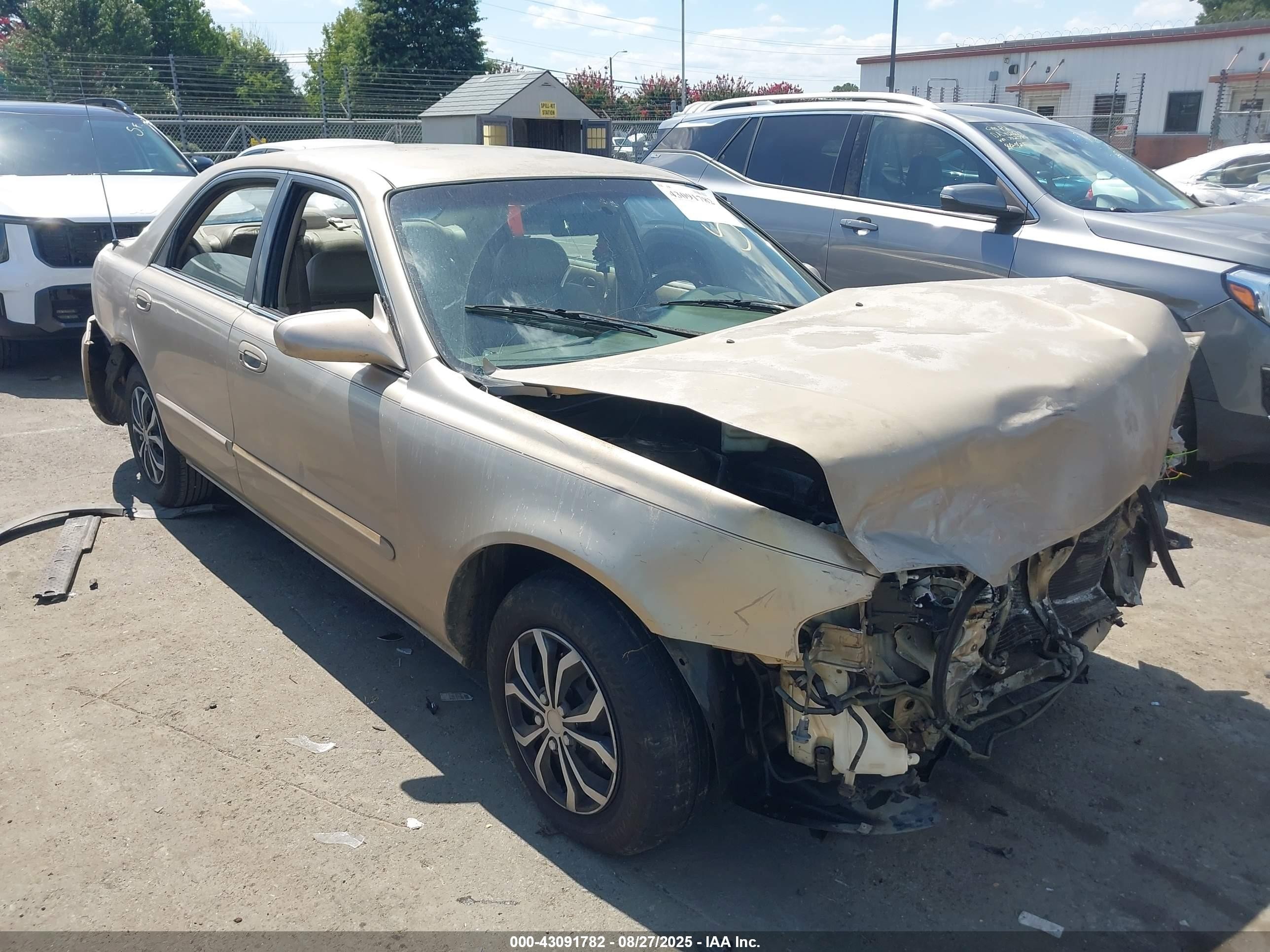 1999 Mazda 626 ES, VIN 1YVGF22C9X5862267 — Front end