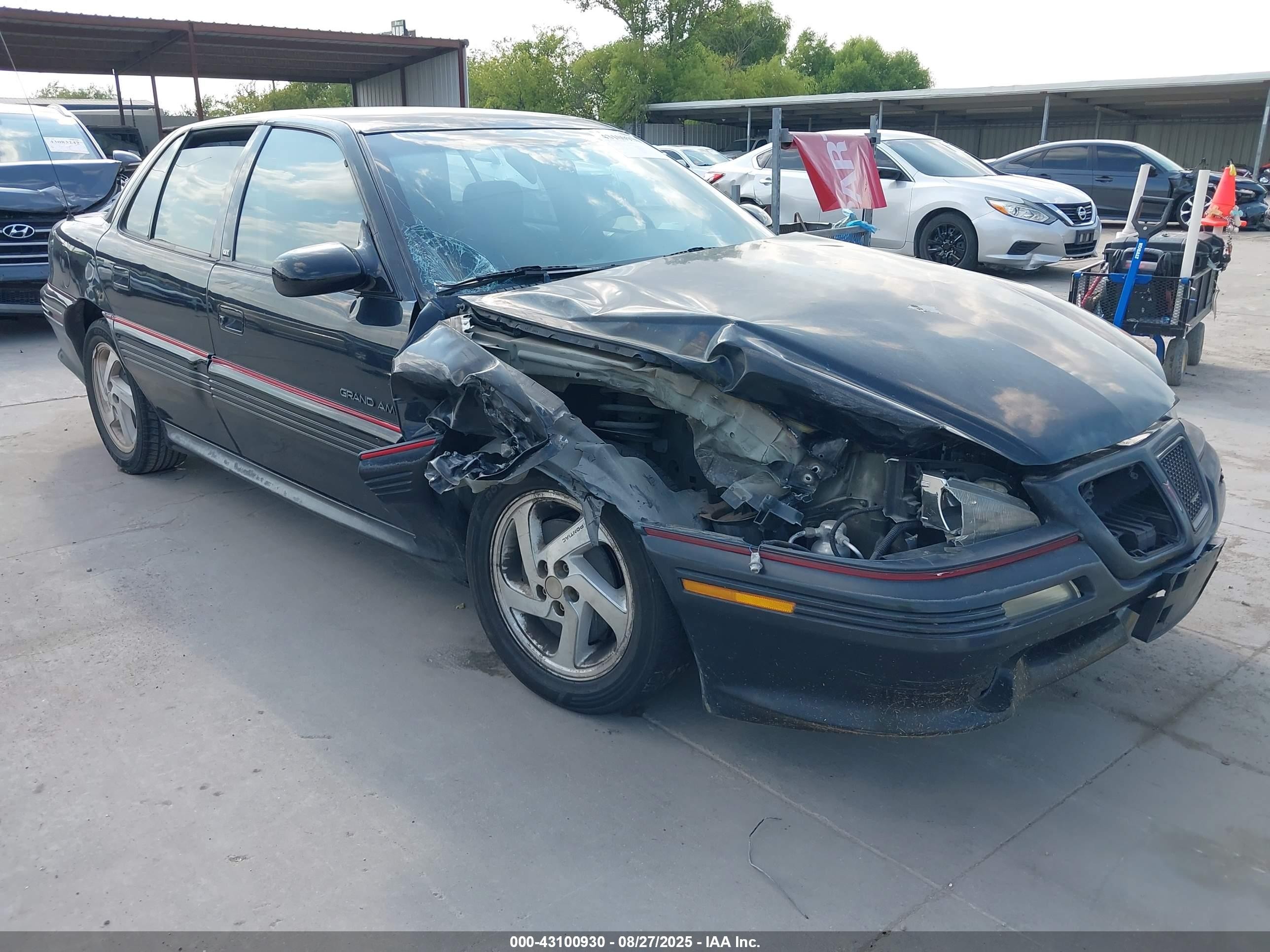 1993 Pontiac Grand Am, VIN 1G2NW54N4PC723449 — Side