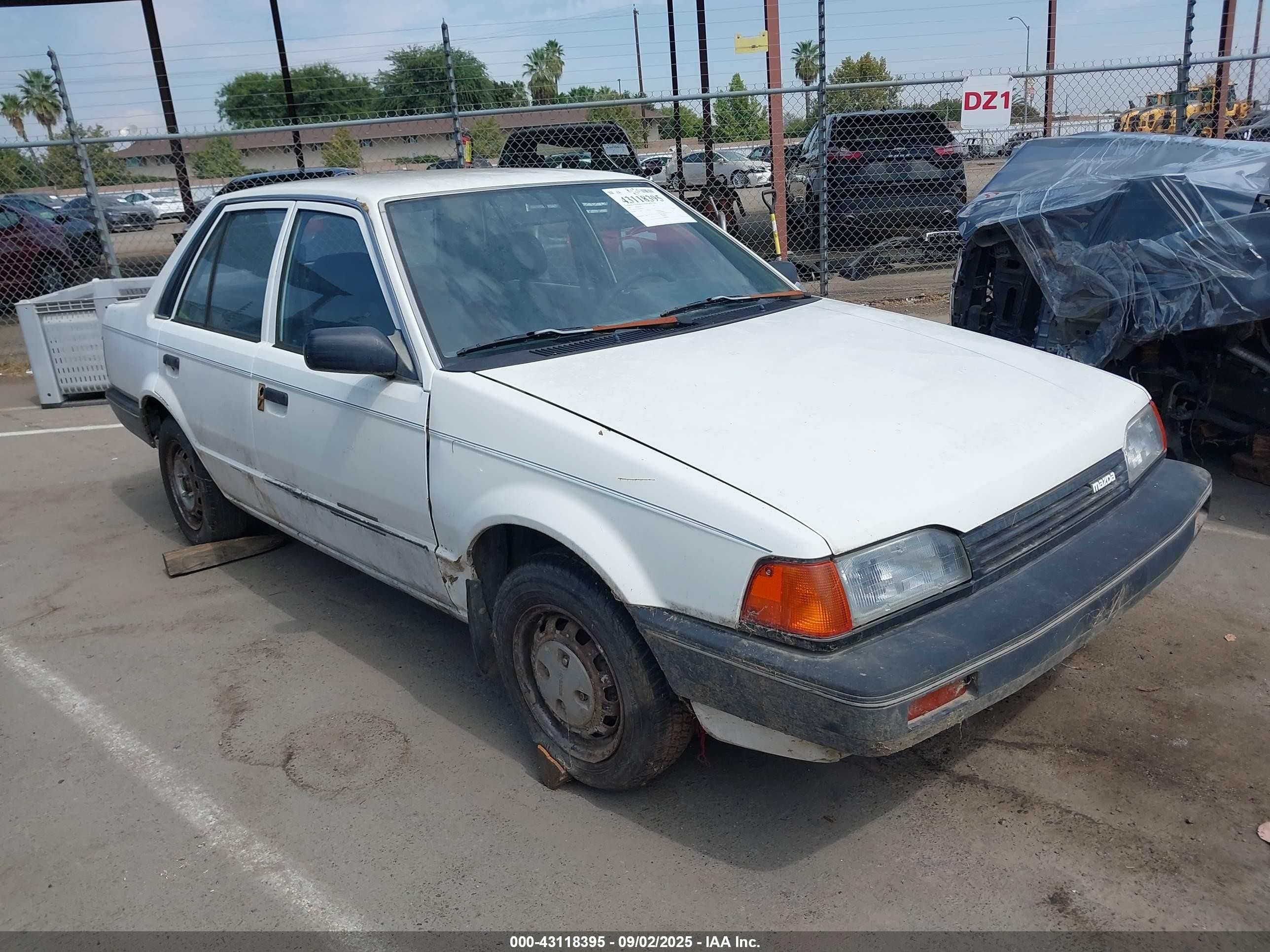 1988 Mazda 323, VIN JM1BF2221J0200954 — All over