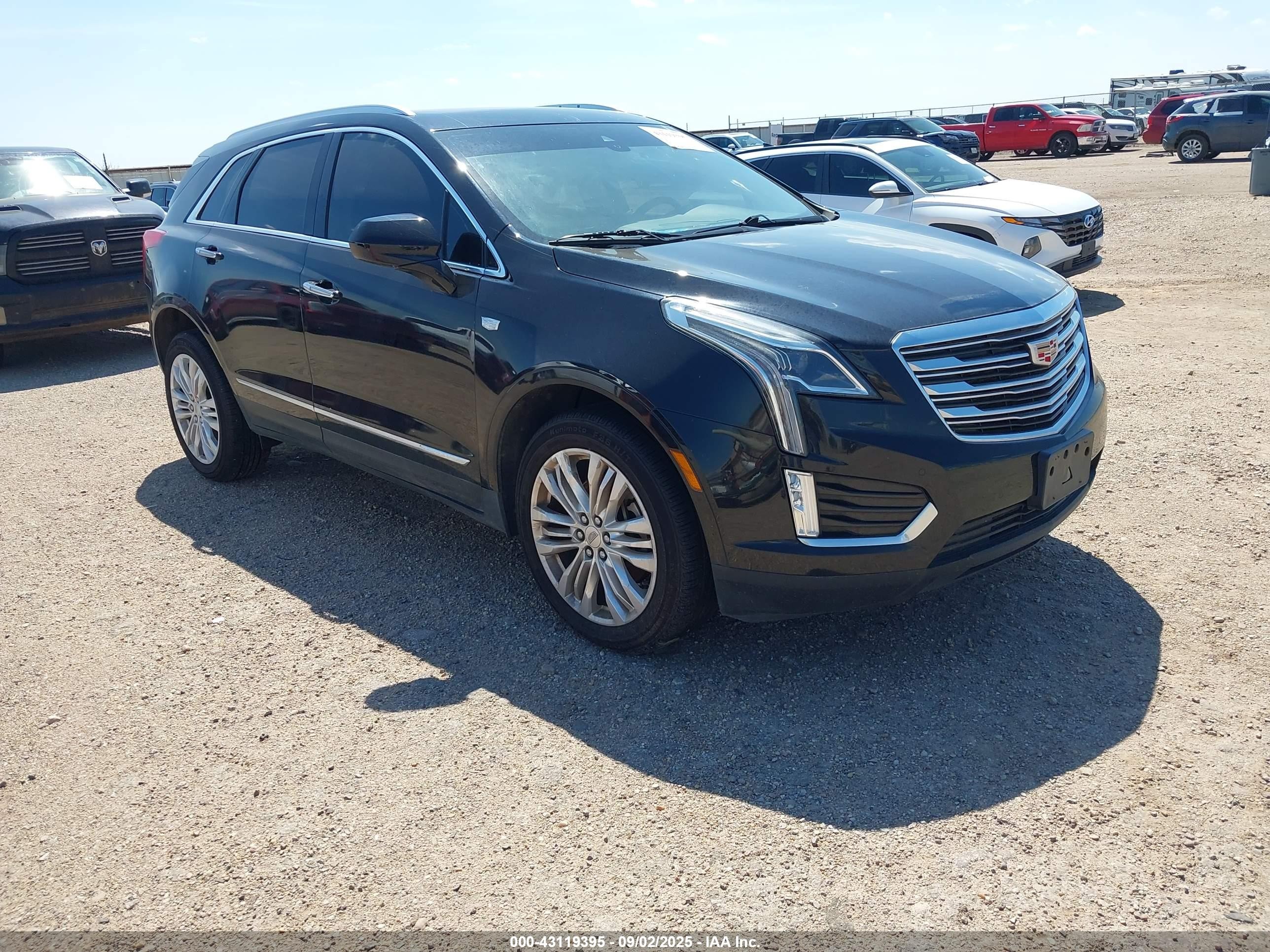 2019 Cadillac XT5 Premium Luxury AWD, VIN 1GYKNFRS8KZ223607 — Storm