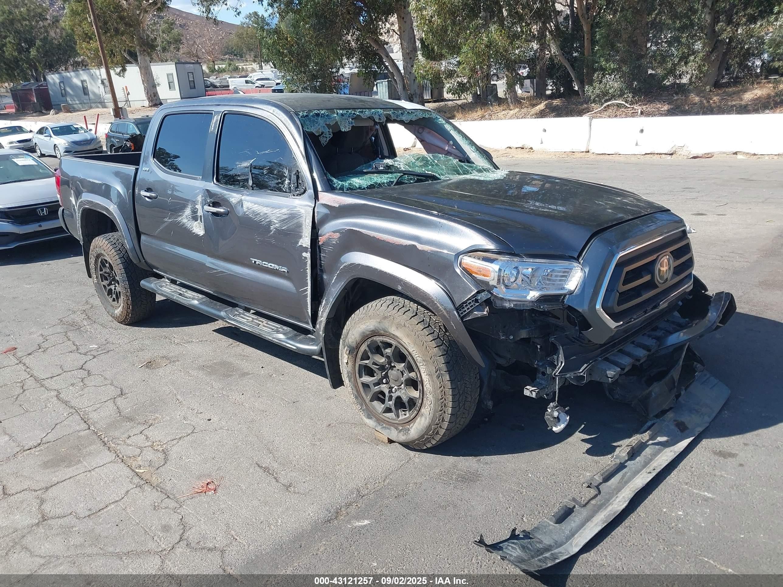 2021 Toyota Tacoma SR, VIN 3TMCZ5AN9MM446225 — Side