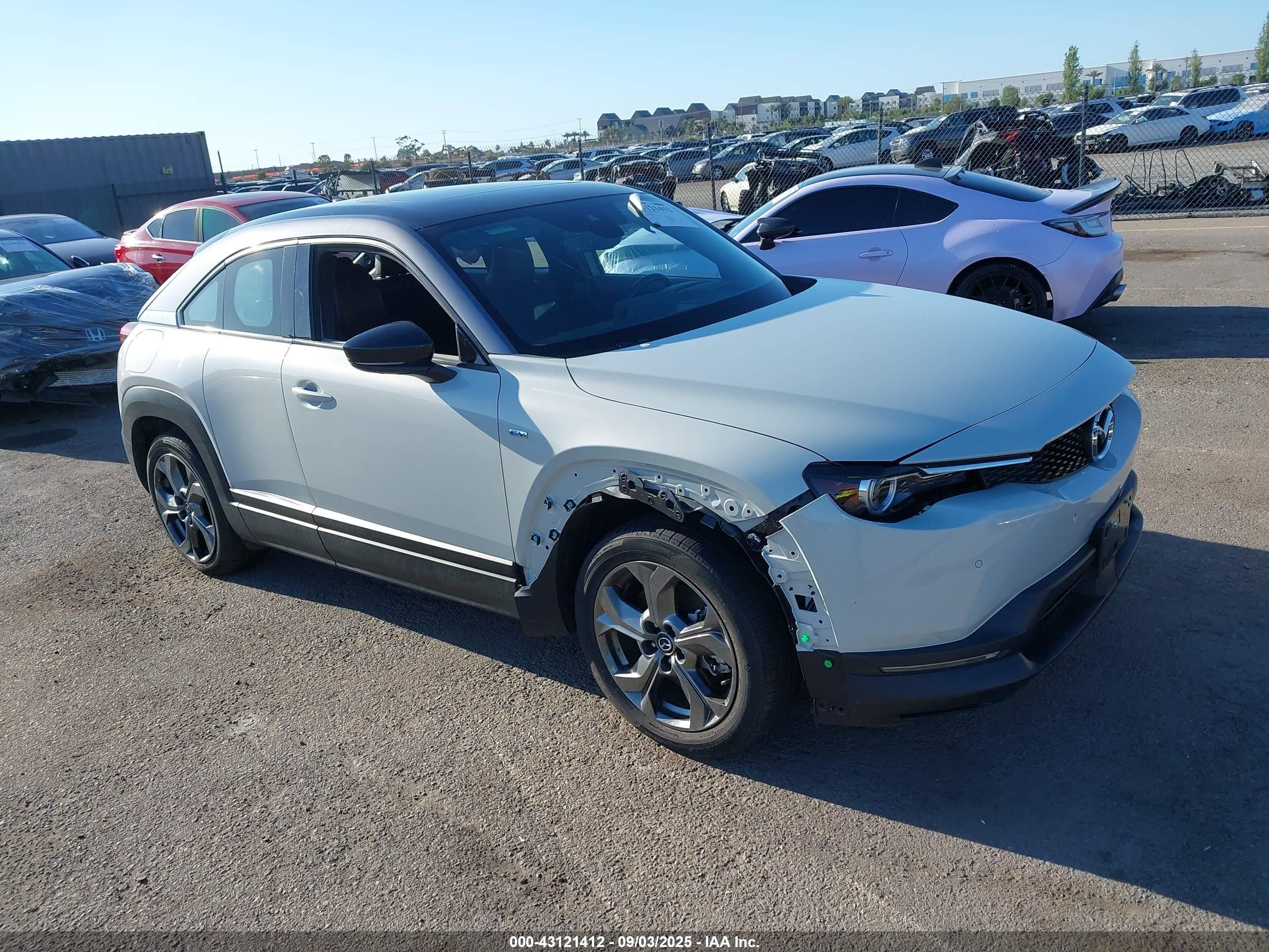 2023 Mazda MX-30 Premium Plus, VIN JM1DRADB0P0200623 — Side