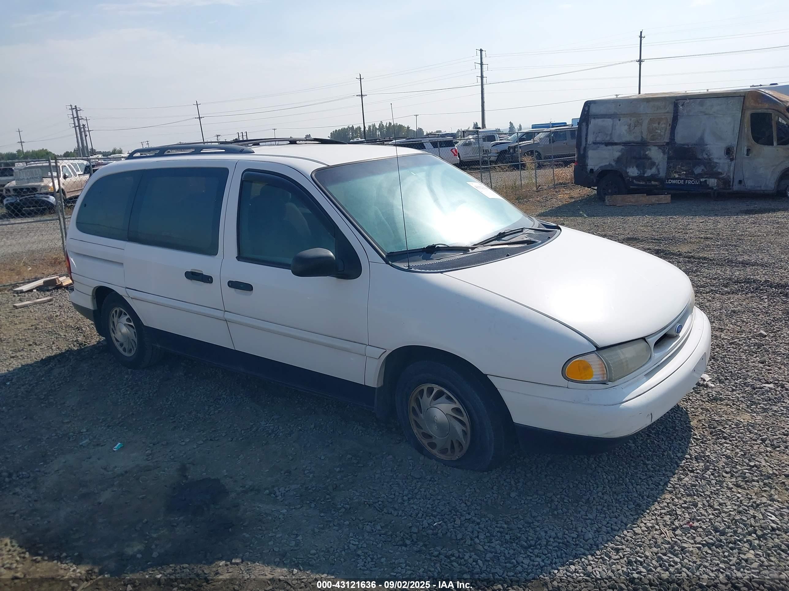 1995 Ford Windstar GL, VIN 2FMDA5141SBB77134 — Normal wear