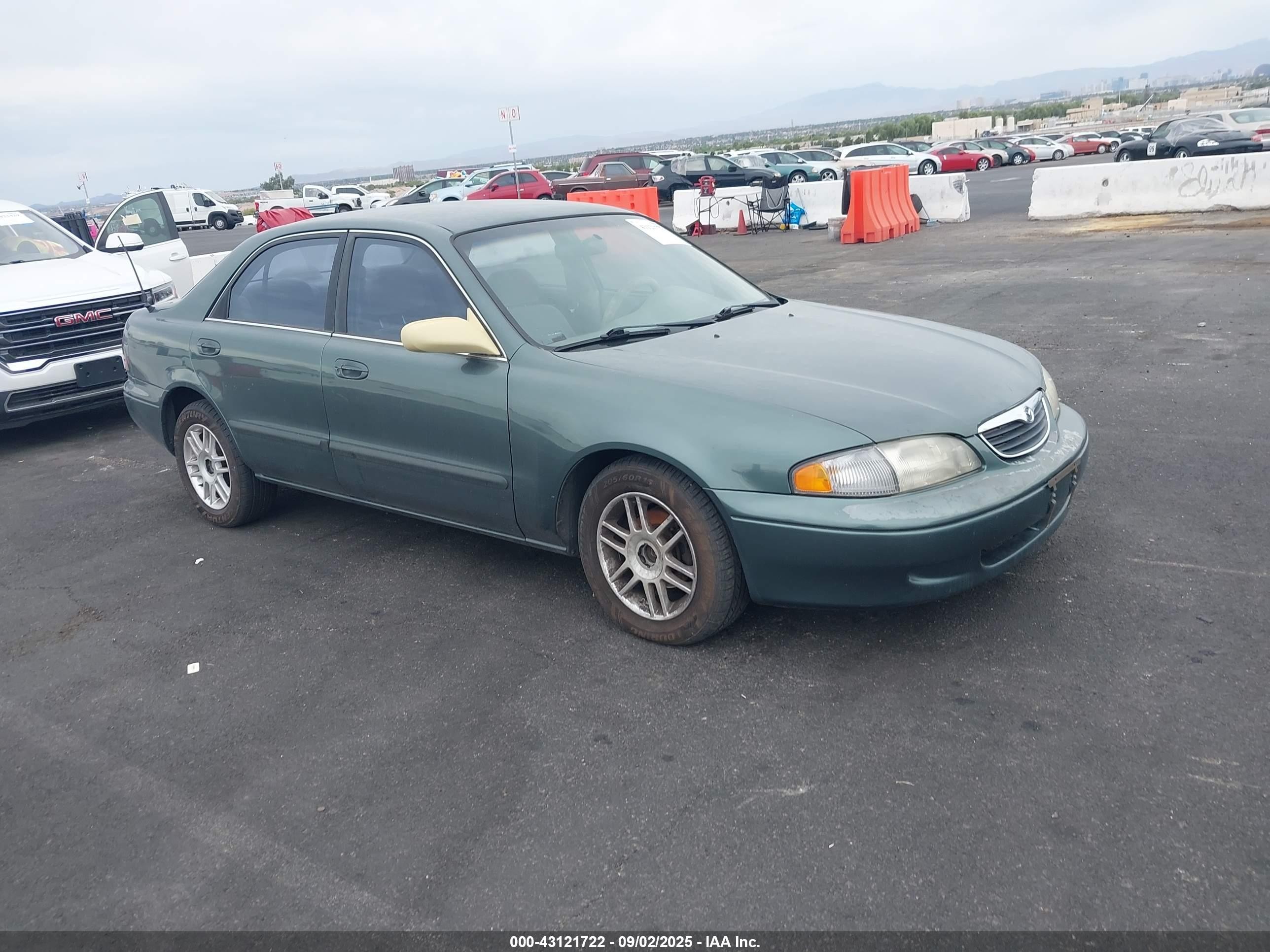 1998 Mazda 626 DX, VIN 1YVGF22C9W5696458 — Front end