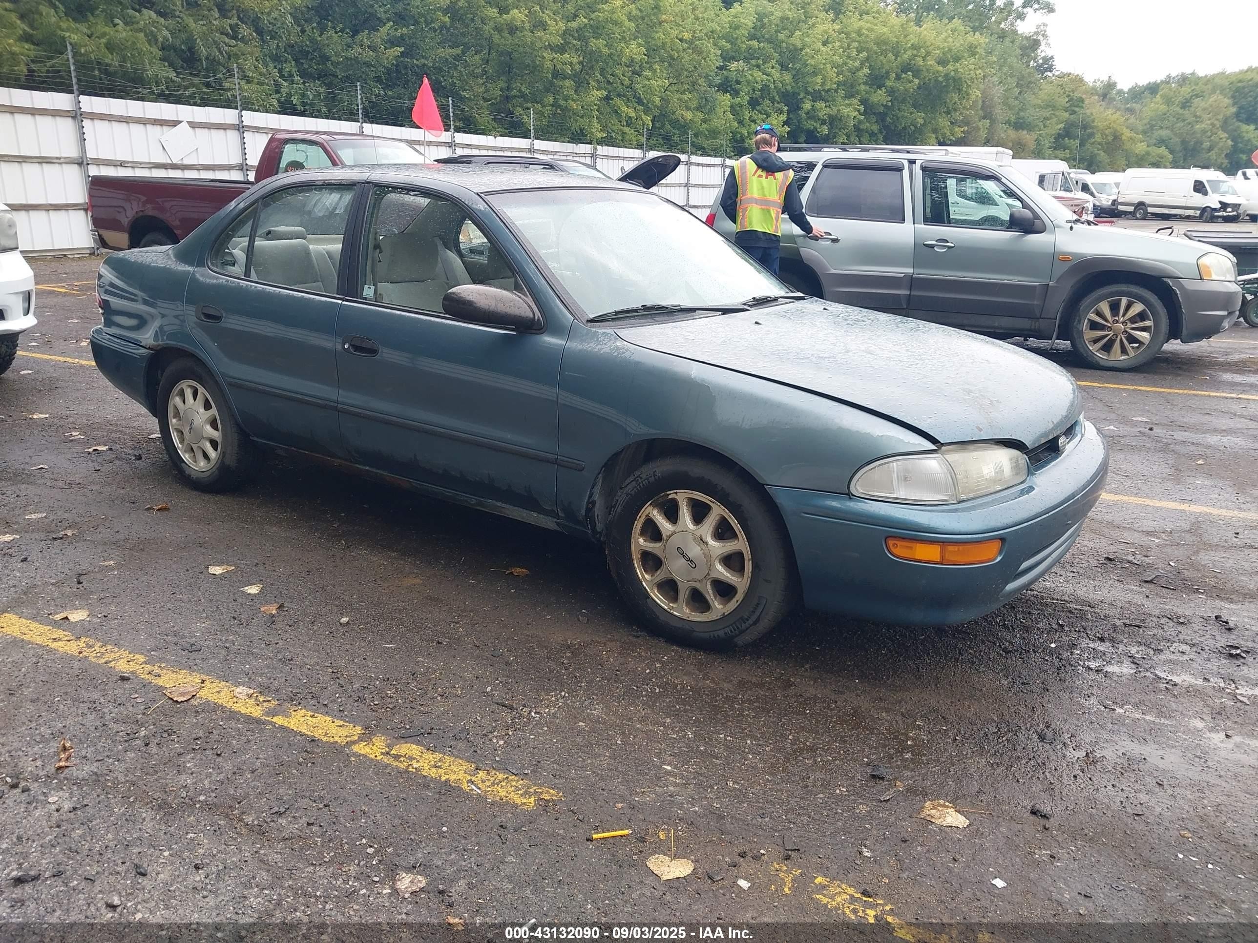 1995 Chevrolet Prizm, VIN 1Y1SK5281SZ096122 — Side