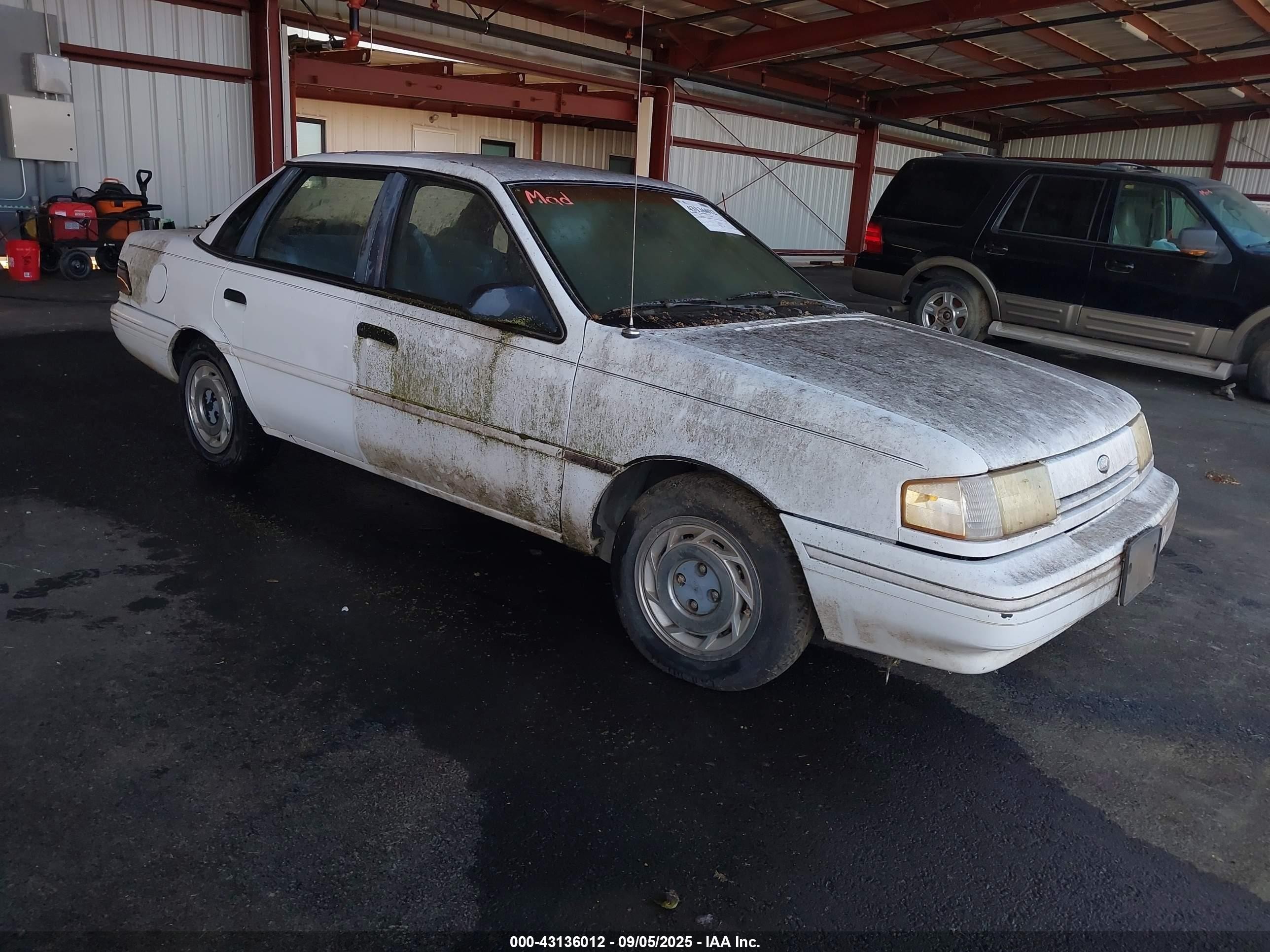 1992 Ford Tempo GL, VIN 2FAPP36X6NB148214 — Normal wear