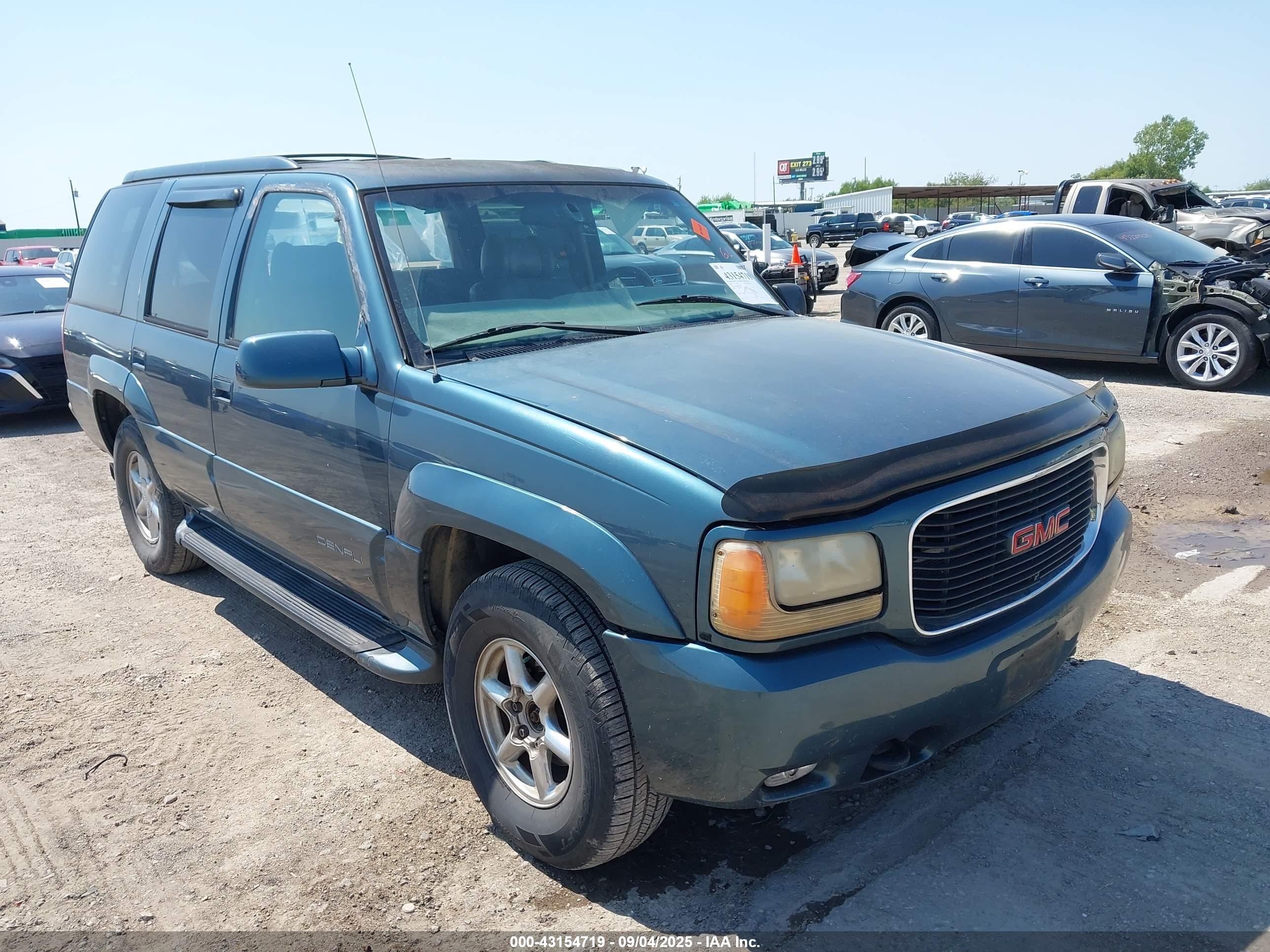 1999 GMC Denali, VIN 1GKEK13R3XR918061 — Rear end