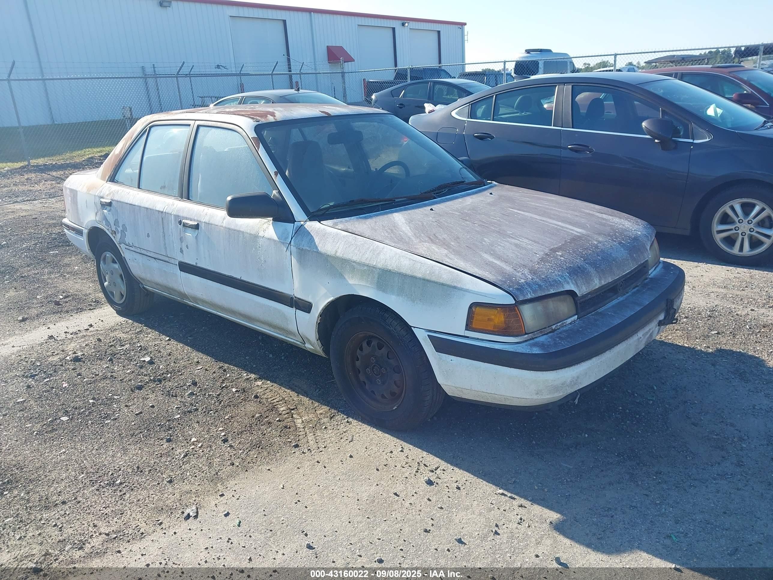 1994 Mazda Protege DX, VIN JM1BG2241R0776926 — Перед